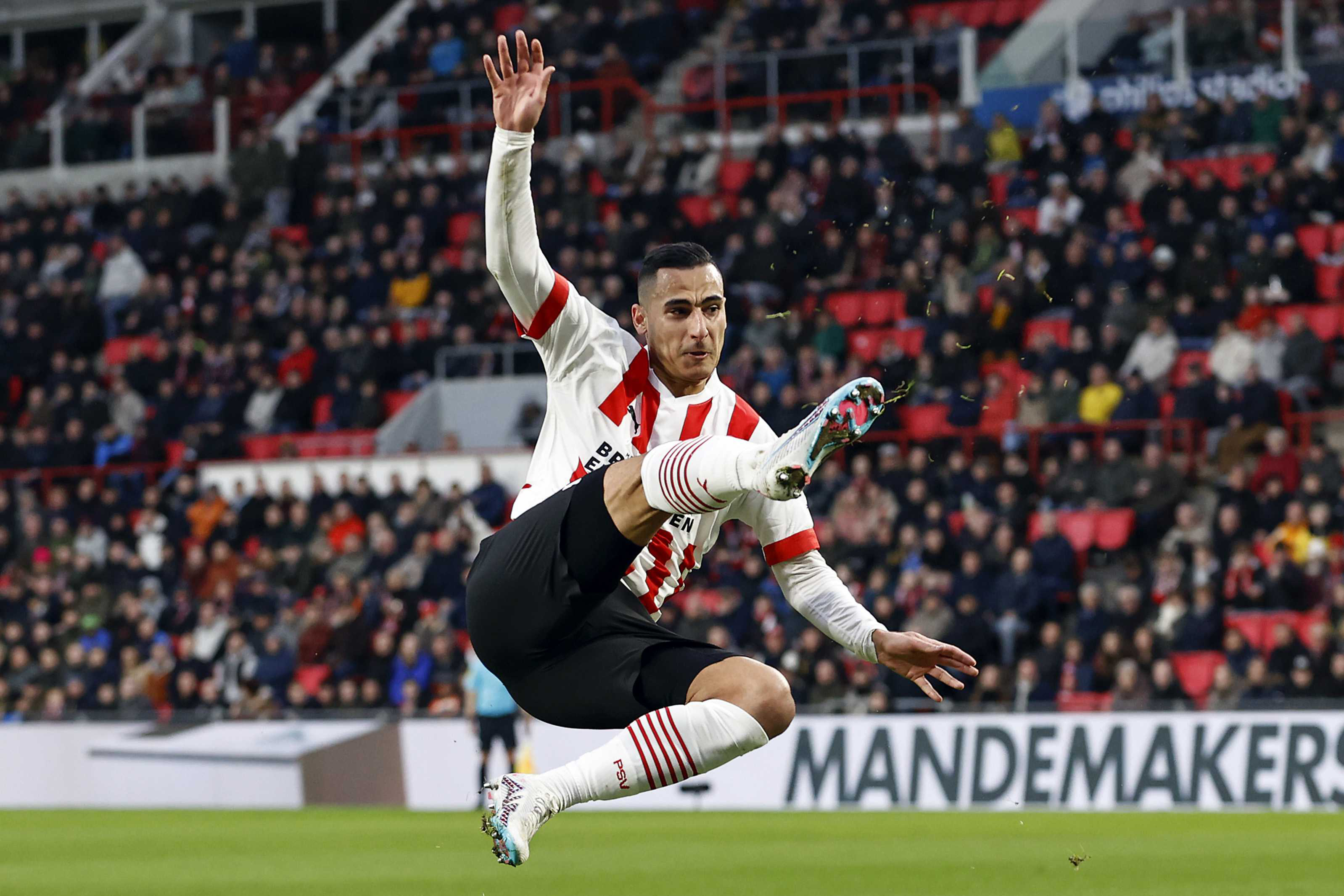 epa10517278 Anwar El Ghazi of PSV Eindhoven scores the 3-1 during the Dutch premier league match between PSV Eindhoven and SC Cambuur Leeuwarden, in Eindhoven, the Netherlands, 12 March 2023.  EPA-EFE/MAURICE VAN STEEN