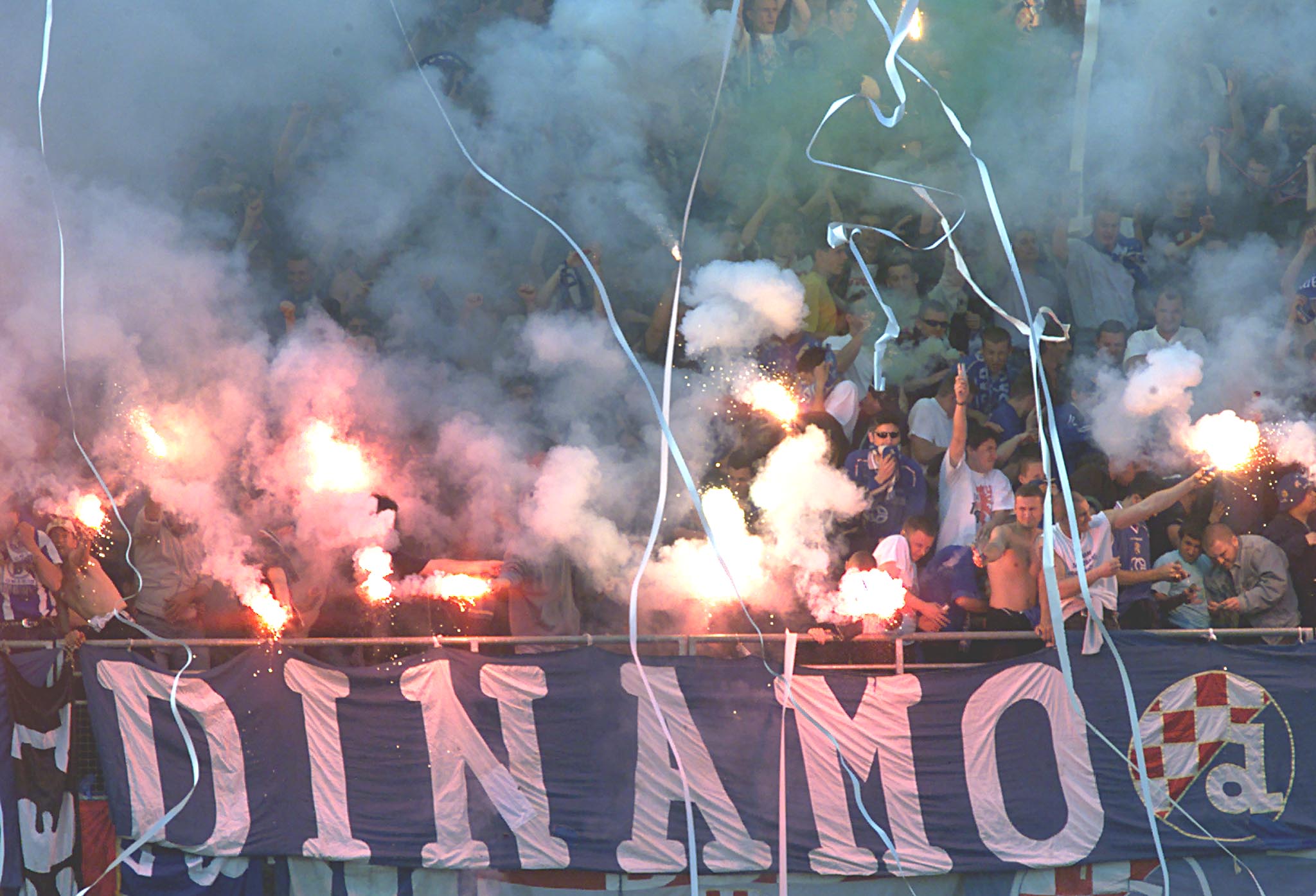 DINAMO ZAGREB 'BAD BLUE BOYS' FANS LIGHT FLARES AT MAKSIMIR STADIUM.
