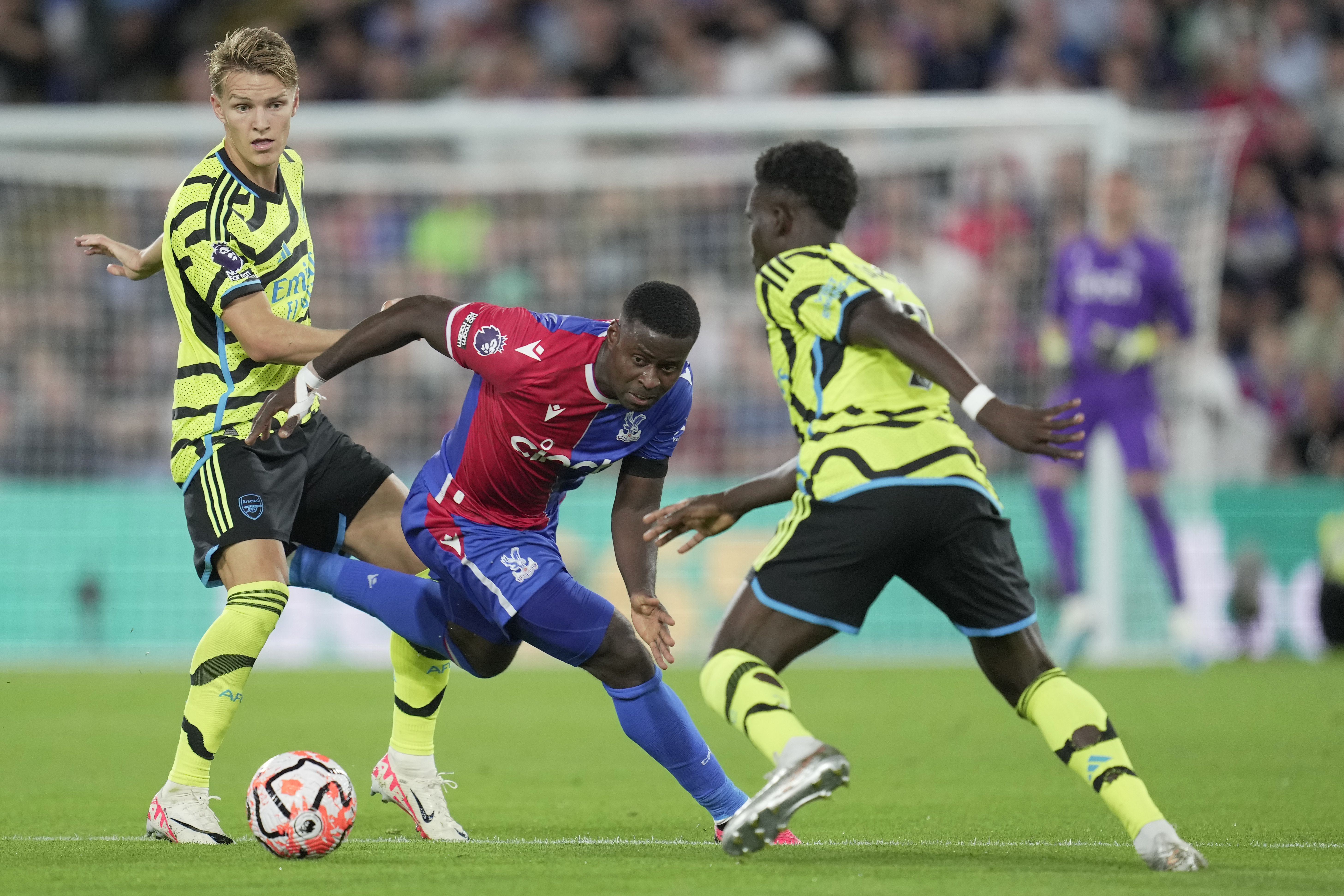 Crystal Palace's Marc Guehi, center, in action during the Premier League soccer match between Crystal Palace and Arsenal at Selhurst Park, in London, England, Monday, Aug. 21, 2023. (AP Photo/Kin Cheung)