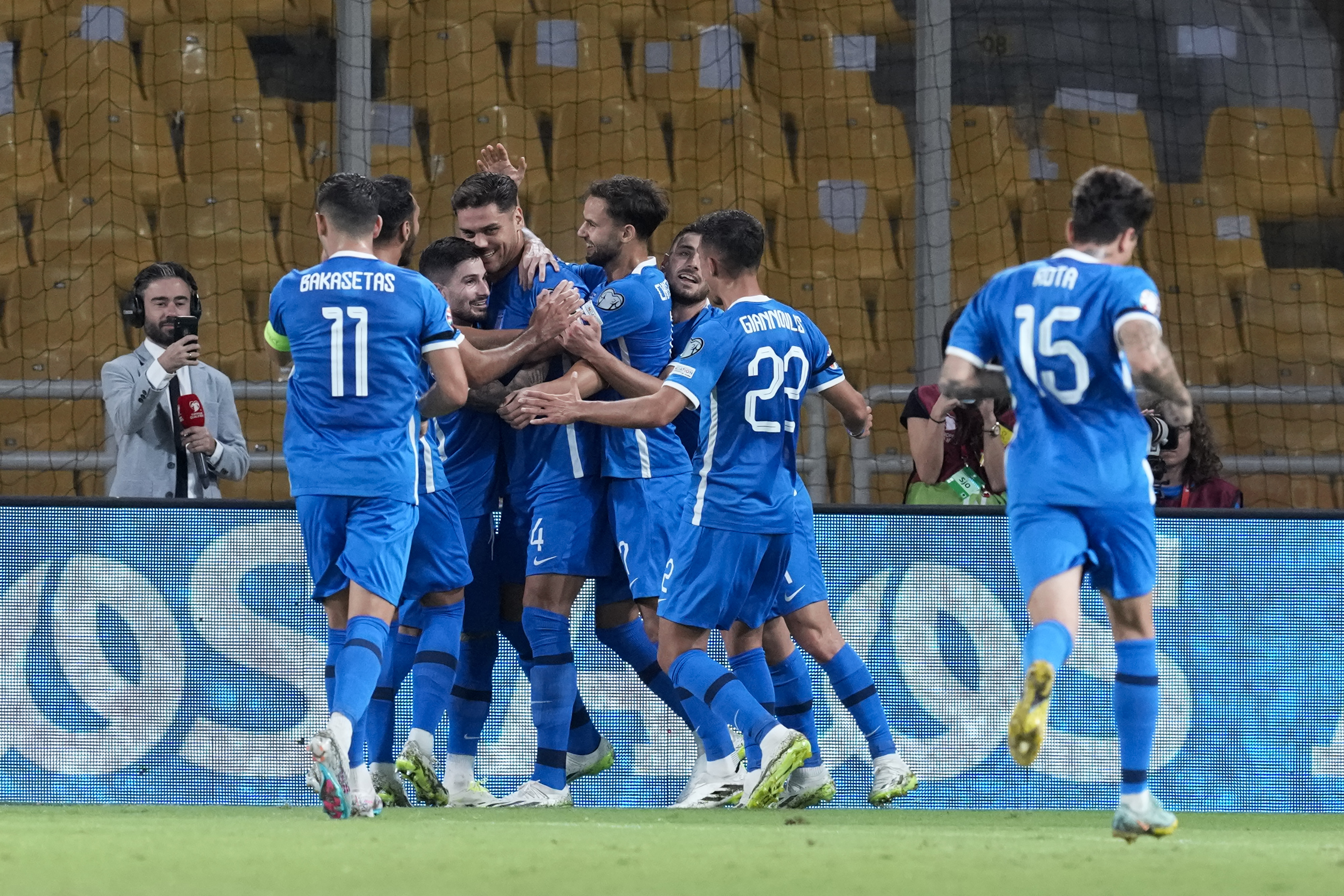 Greece players celebrate after scoring against Gibraltar during the Euro 2024 group B qualifying soccer match between Greece and Gibraltar at OPAP Arena in Athens, Greece, Sunday, Sept. 10, 2023. (AP Photo/Yorgos Karahalis)