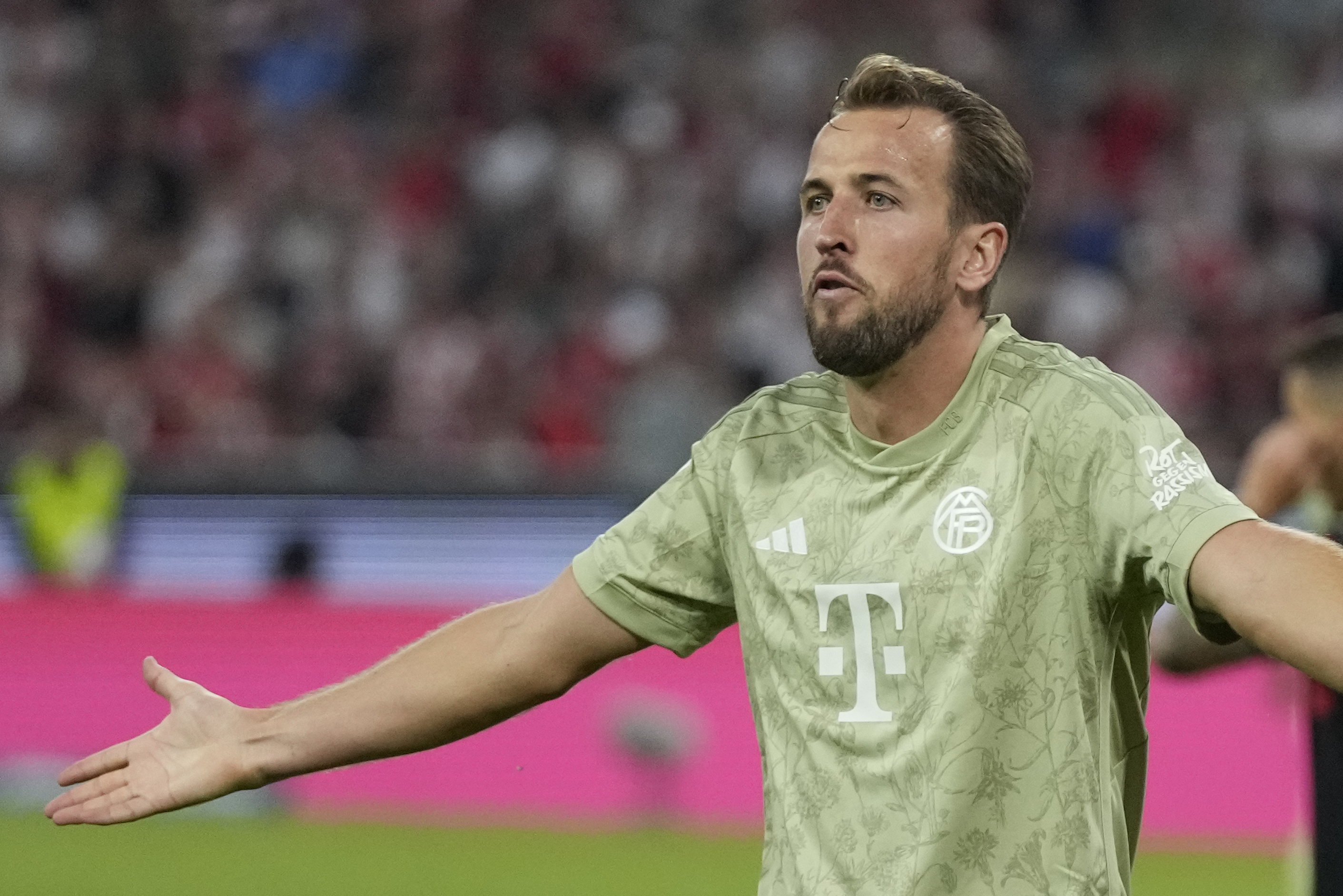 Bayern's Harry Kane reacts during the German Bundesliga soccer match between Bayern Munich and Bayer 04 Leverkusen, at the Allianz Arena stadium in Munich, Germany, Friday, Sept. 15, 2023. (AP Photo/Matthias Schrader)