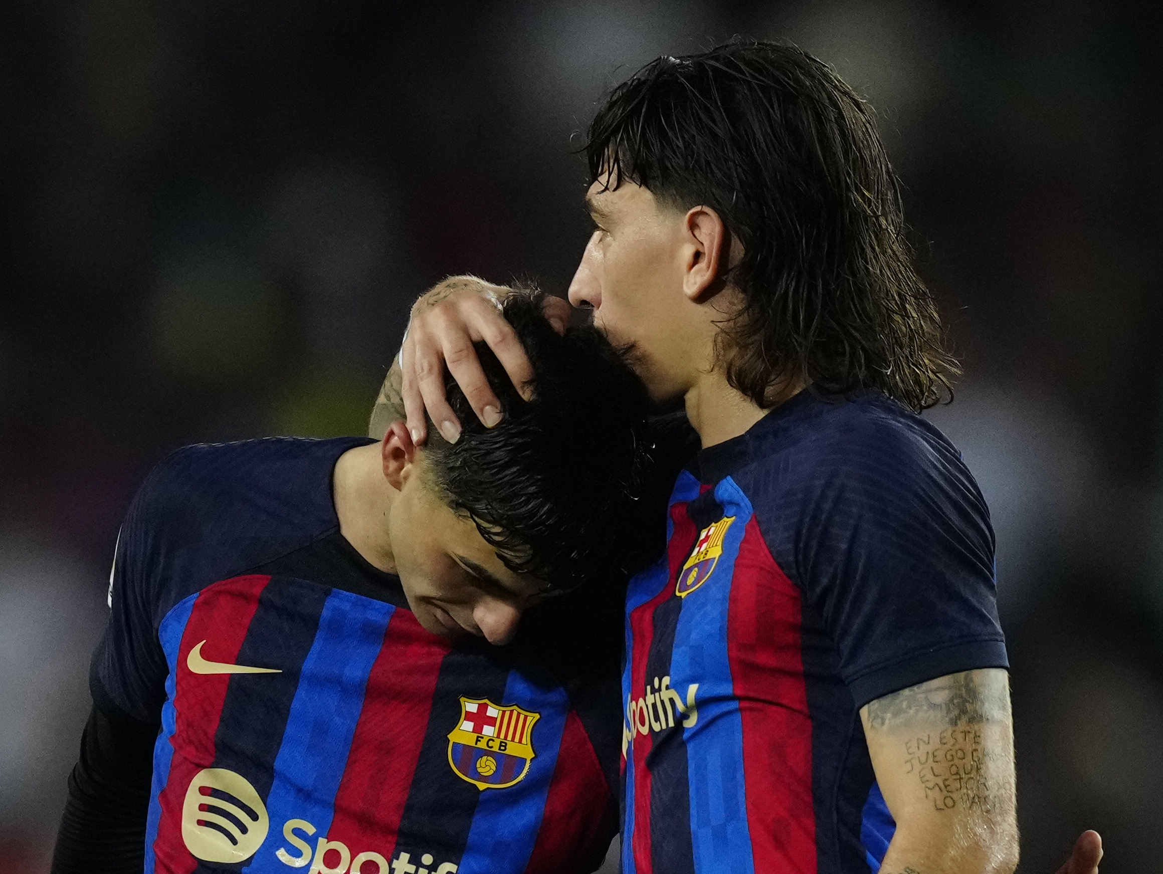 epa10255672 FC Barcelona players Hector Bellerin (R) and Pedri Gonzalez (L) react after winning the Spanish LaLiga soccer match between FC Barcelona and Villarreal CF in Barcelona, Spain, 20 October 2022.  EPA-EFE/Enric Fontcuberta