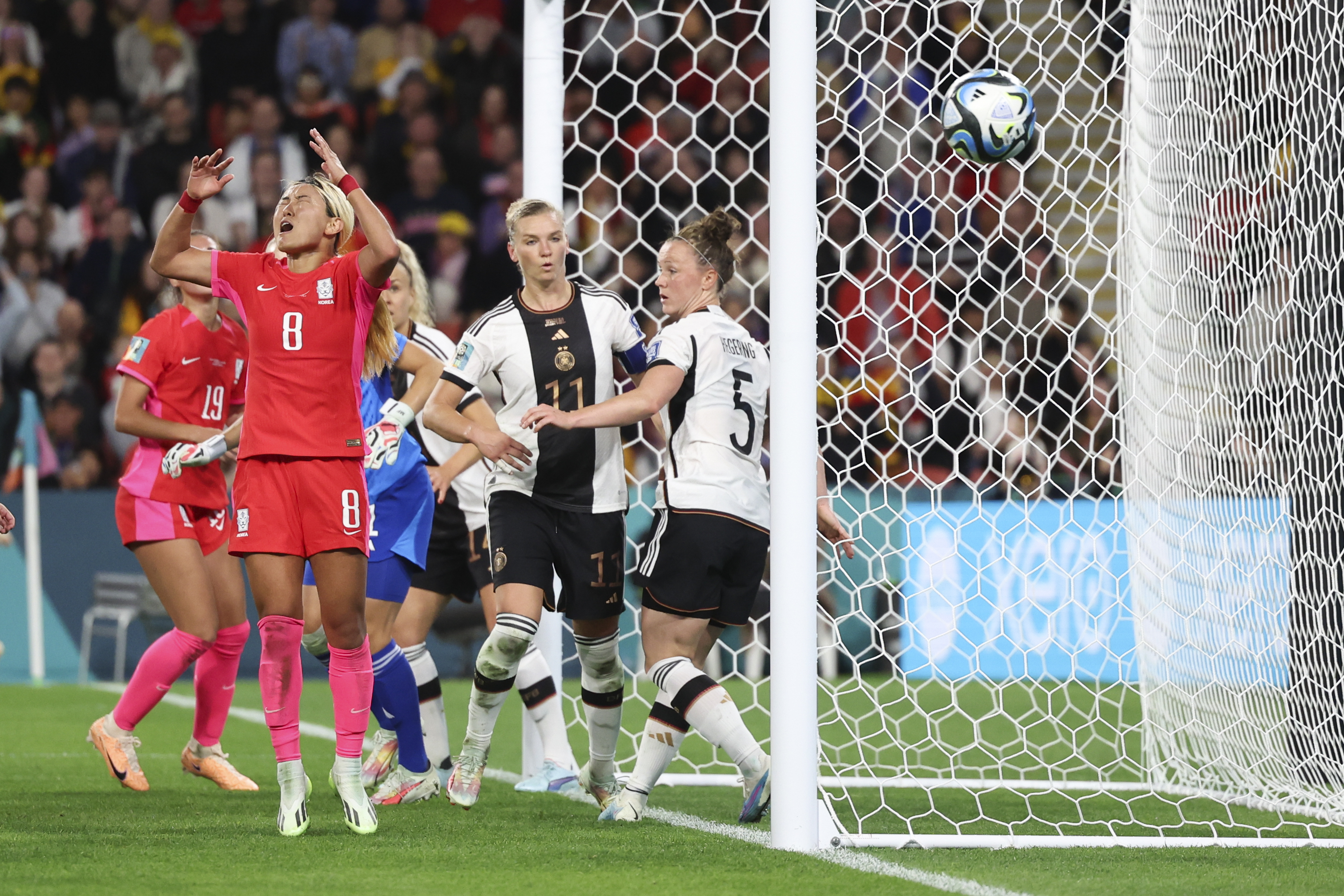 South Korea's Cho So-hyun, left, reacts following a corner kick during the Women's World Cup Group H soccer match between South Korea and Germany in Brisbane, Australia, Thursday, Aug. 3, 2023. (AP Photo/Aisha Schulz)