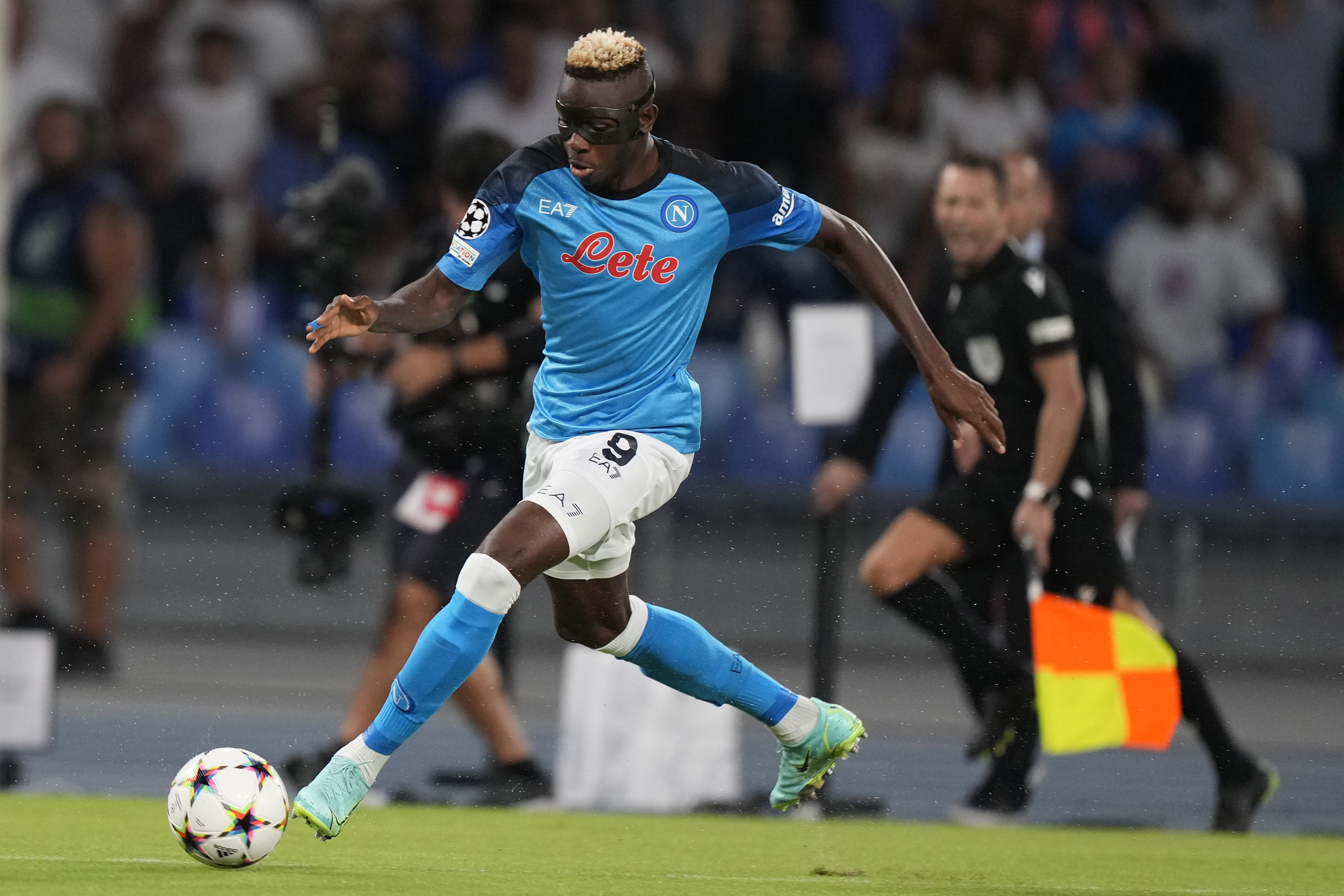 Napoli's Victor Osimhen controls the ball during the group A Champions League soccer match between Napoli and Liverpool at the Diego Armando Maradona stadium in Naples, Italy, Wednesday, Sept. 7, 2022. (AP Photo/Andrew Medichini)