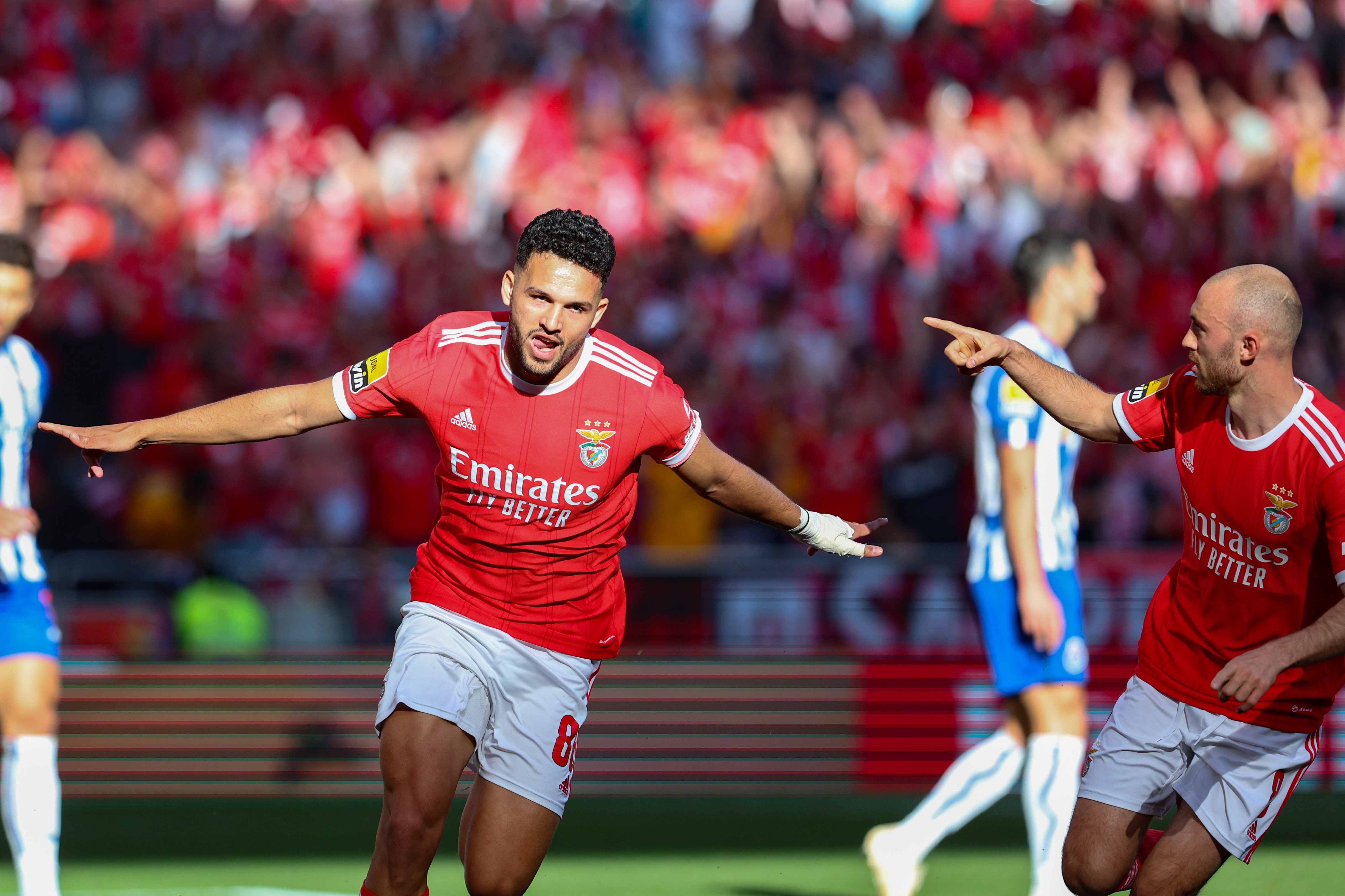 epa10563688 SL Benfica player Goncalo Ramos (L) celebrates after scoring the 1-0 lead, during the Portuguese First League soccer match, between SL Benfica and FC Porto, at Luz stadium in Lisbon, Portugal, 07 April 2023.  EPA-EFE/ANTONIO COTRIM