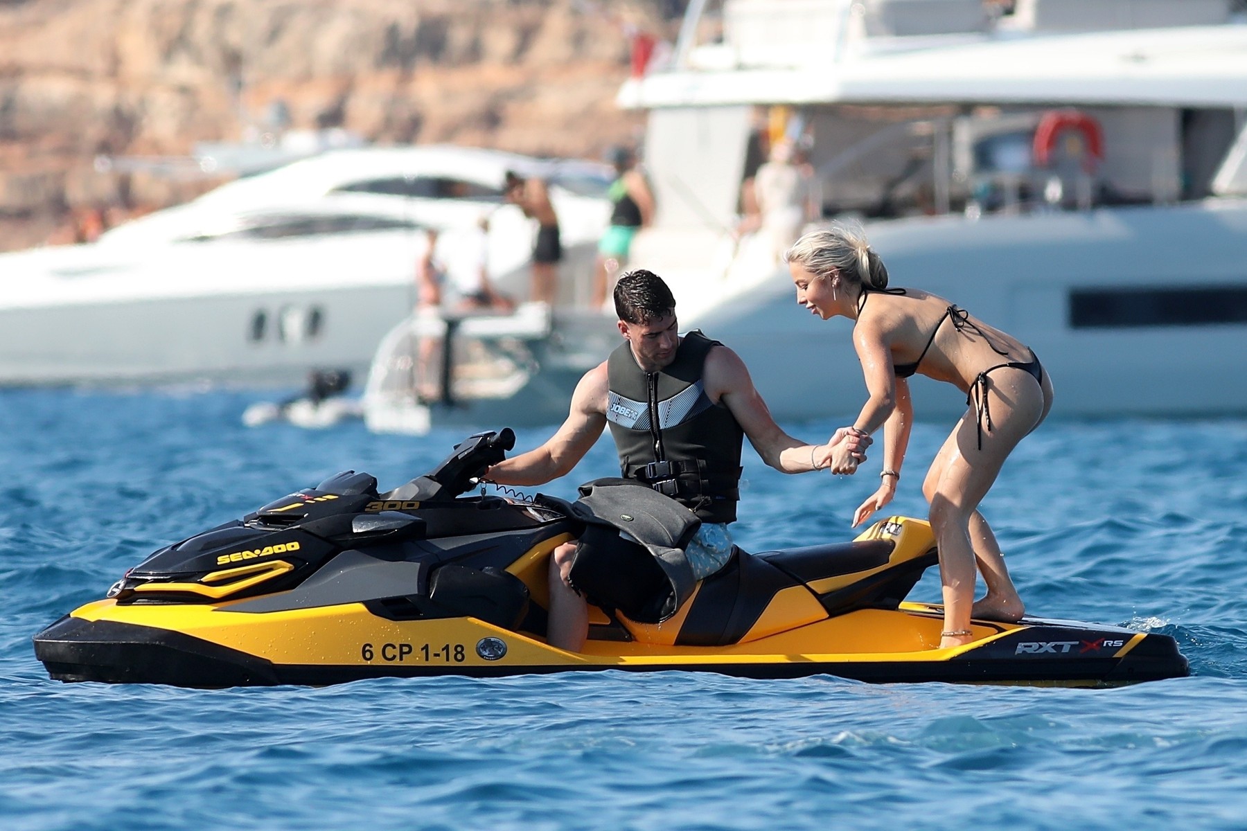 *EXCLUSIVE* Juventus/Serbian striker Dusan Vlahovic enjoys a summer break with friends in Formentera