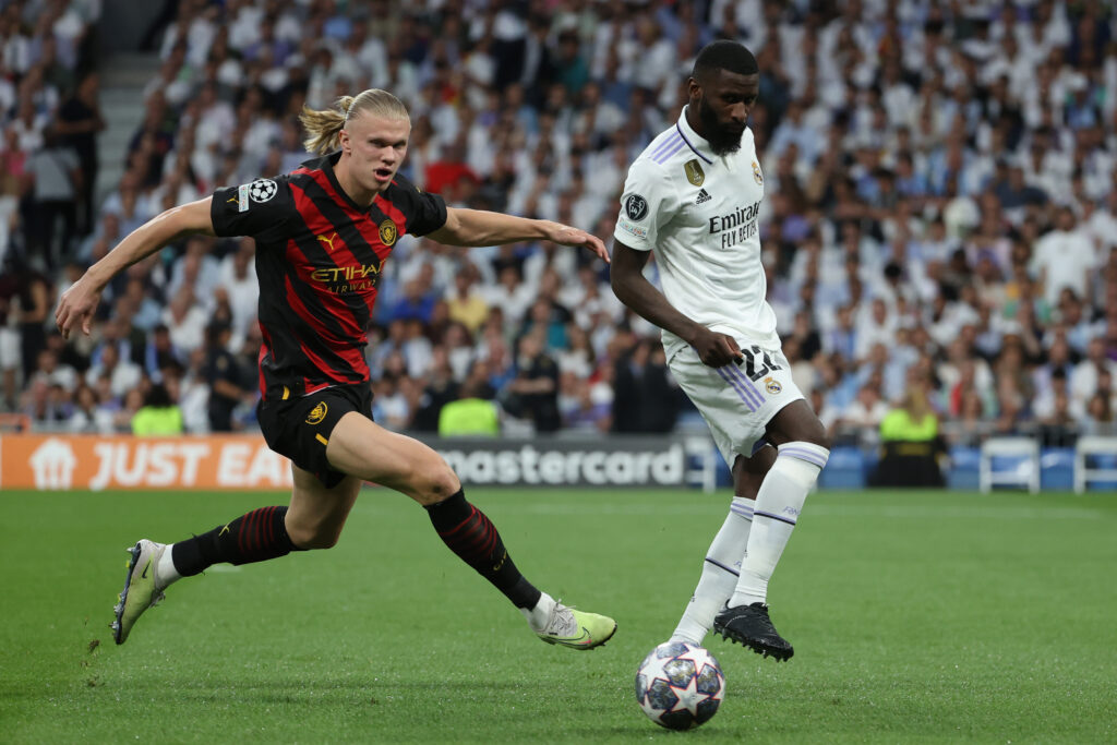 epa10617980 Real Madrid's Antonio Rudiger (R) in action against Manchester City's Erling Haaland during the UEFA Champions League semifinal first leg soccer match between Real Madrid and Manchester City, in Madrid, Spain, 09 May 2023.  EPA-EFE/Kiko Huesca