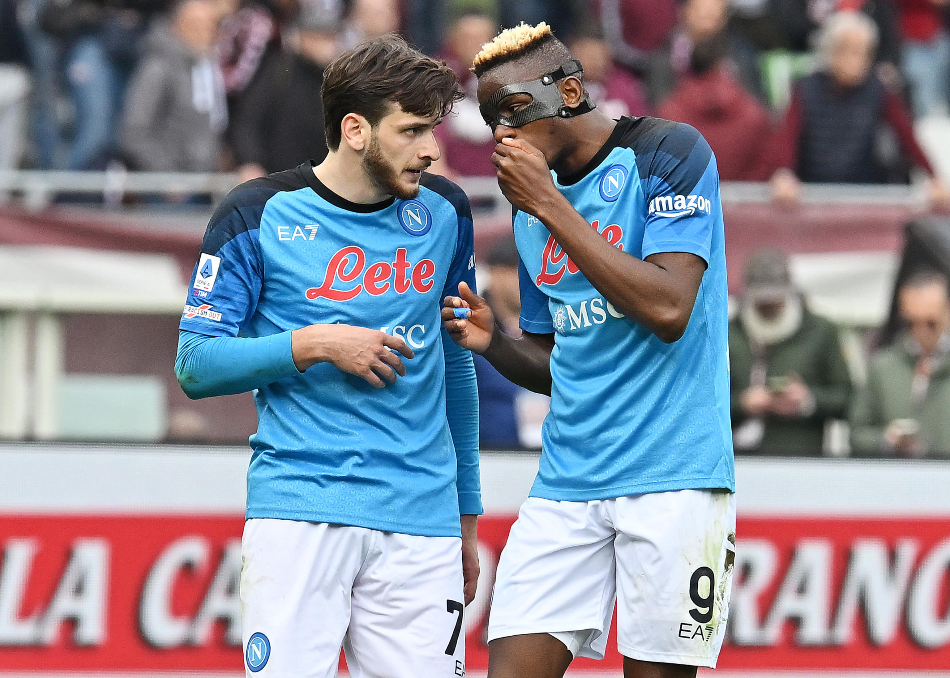 epa10532116 Napoli's Khvicha Kvaratskhelia (L) interacts with teammate Victor Osimhen after scoring the 0-2 goal during the Italian Serie A soccer match between Torino FC and SSC Napoli, in Turin, Italy, 19 March 2023.  EPA-EFE/ALESSANDRO DI MARCO