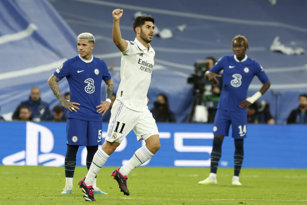 epa10570153 Real Madrid's Marco Asensio celebrates after scoring the 2-0 goal during the UEFA Champions League quarter final first leg soccer match between Real Madrid and Chelsea FC, in Madrid, Spain, 12 April 2023.  EPA-EFE/Chema Moya