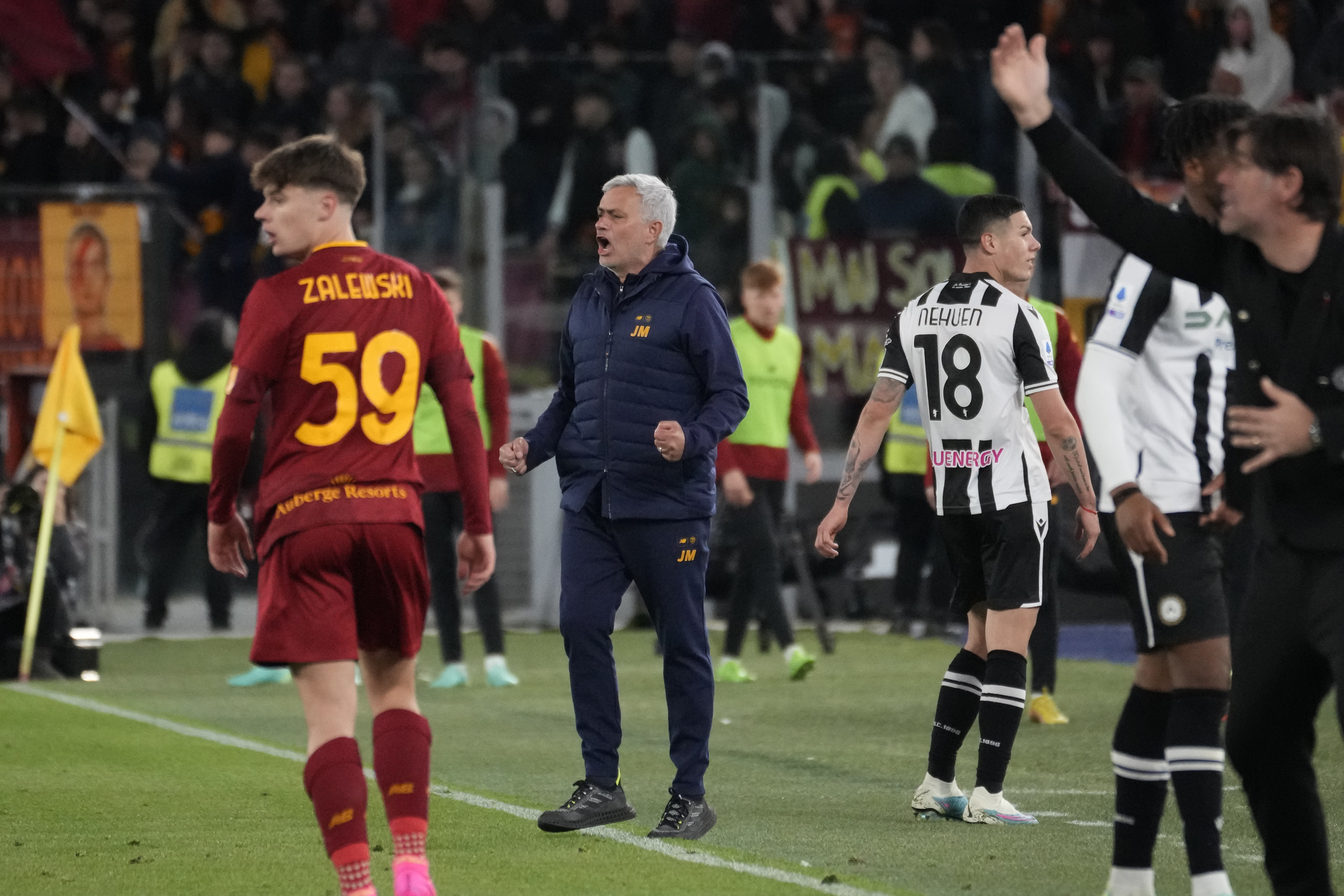 Roma's head coach Jose Mourinho, centre, reacts during the Serie A soccer match between Roma and Udinese at Rome's Olympic Stadium, Sunday, April 16, 2023. (AP Photo/Andrew Medichini)