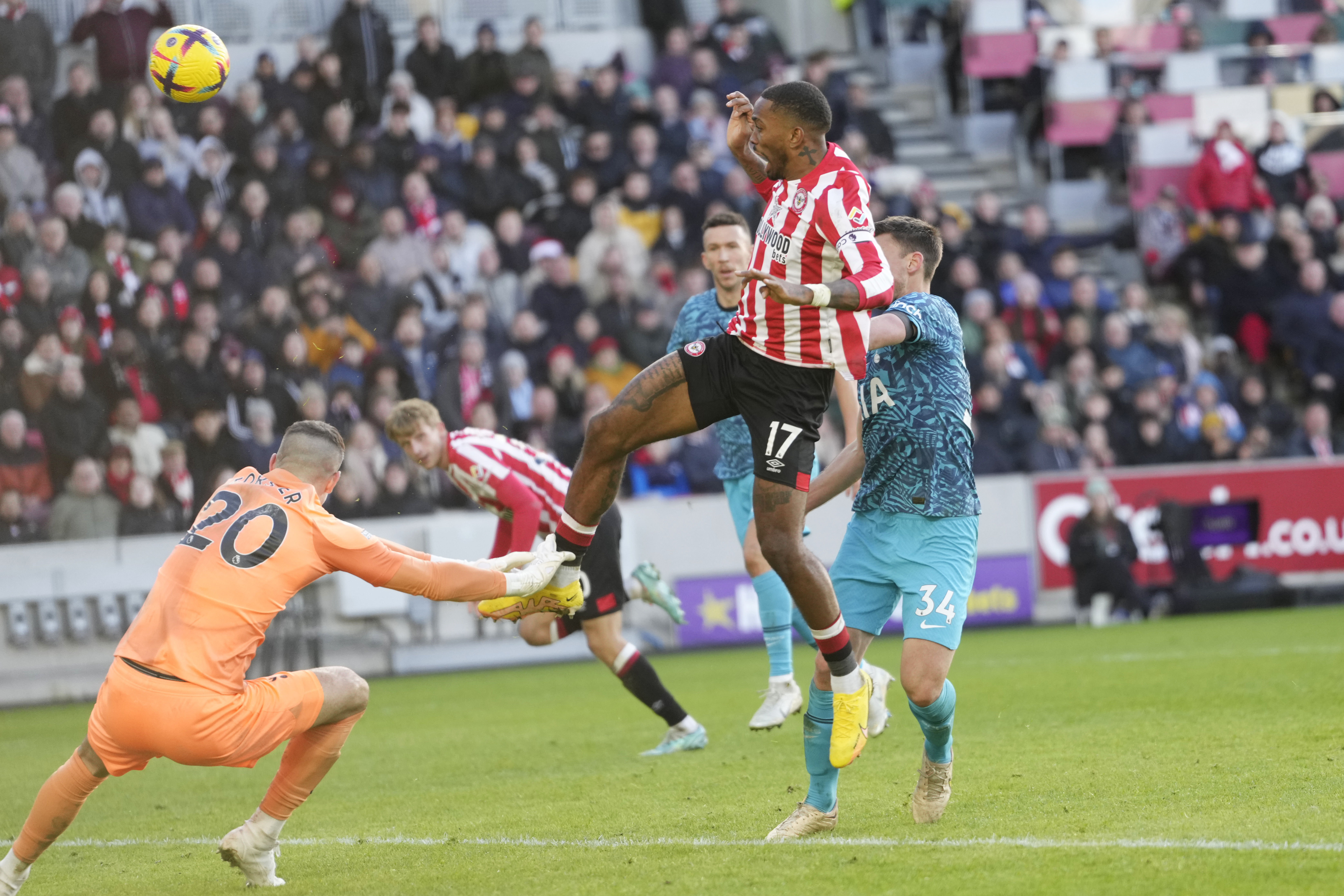 Brentford's Ivan Toney, centre, misses a chance to score during the English Premier League soccer match between Brentford and Tottenham Hotspur at the Gtech Community Stadium in London, Monday, Dec. 26, 2022. (AP Photo/Kirsty Wigglesworth)