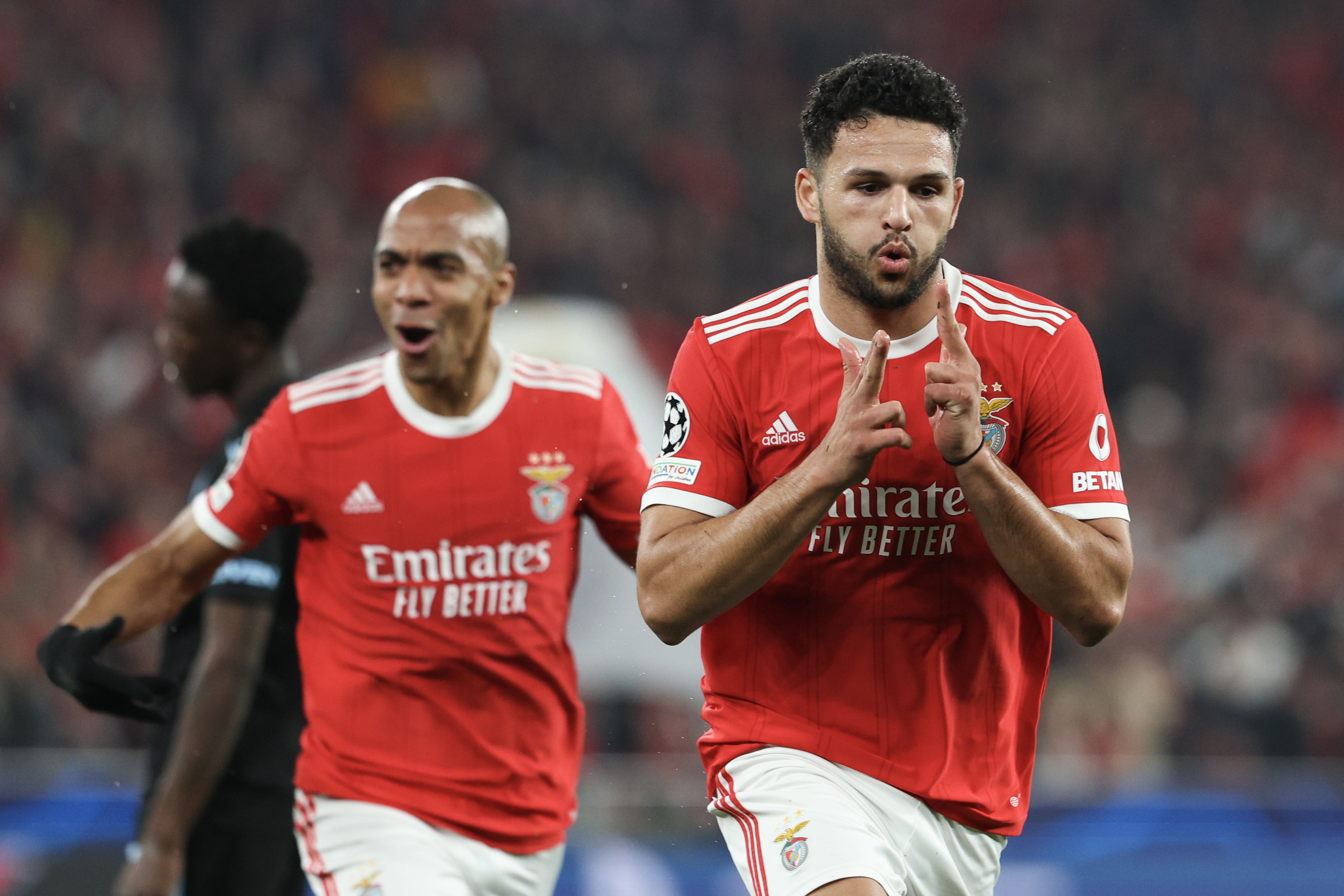epa10508272 Benfica's Goncalo Ramos (R) celebrates after scoring the 2-0 goal during the UEFA Champions League second leg soccer match between Benfica and Club Brugge, in Lisbon, Portugal, 07 March 2023.  EPA-EFE/ANTONIO COTRIM