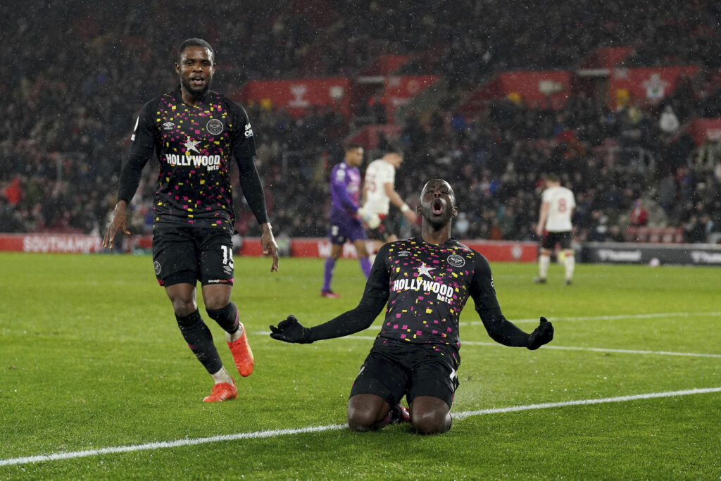 Brentford's Yoane Wissa, right, celebrates after scoring his sides second goal, during the English Premier League soccer match between Southampton and Brentford at St Mary's Stadium in Southampton, England, Wednesday March 15, 2023. (Adam Davy/PA via AP)