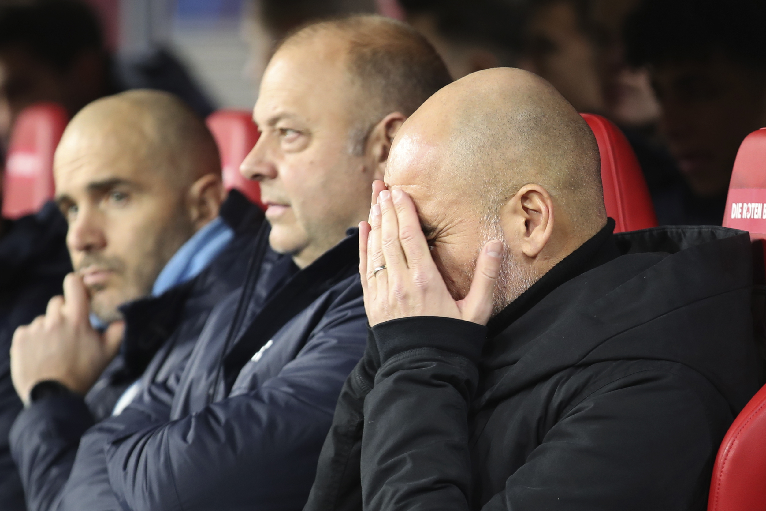 Manchester City's head coach Pep Guardiola, right, waits for the start of the UEFA Champions League round of sixteen first leg soccer match between RB Leipzig and Manchester City in Leipzig, Germany, Wednesday, Feb. 22, 2023. (AP Photo/Andreas Gora)