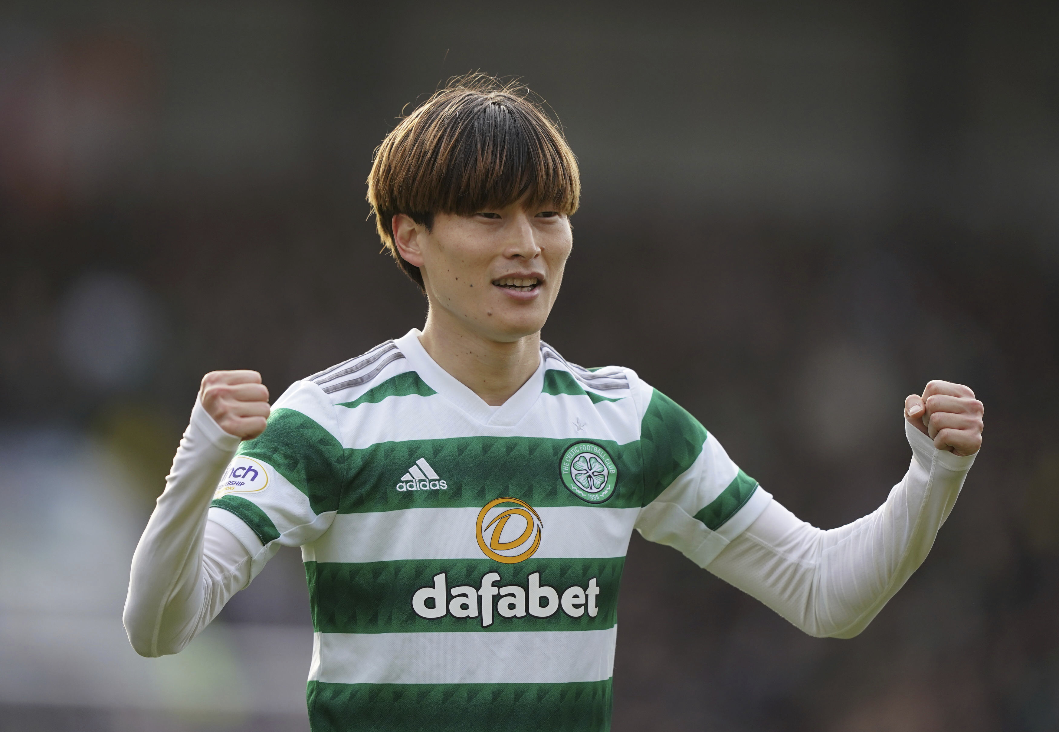 Celtic's Kyogo Furuhashi celebrates scoring his side's second goal of the game during the Scottish Premiership soccer match between Celtic and St. Johnstone, at McDiarmid Park, Perth, Scotland, Sunday Feb. 5, 2023. (Andrew Milligan/PA via AP)