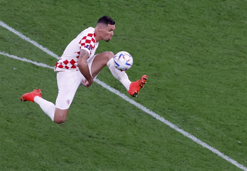 epa10341928 Dejan Lovren of Croatia in action during the FIFA World Cup 2022 group F soccer match between Croatia and Belgium at Ahmad bin Ali Stadium in Doha, Qatar, 01 December 2022.  EPA-EFE/Rolex dela Pena