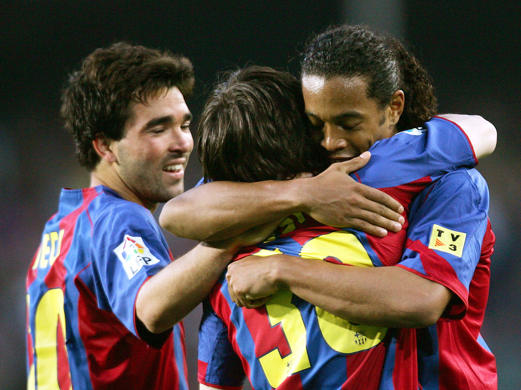 Barcelona's players Ronaldinho, Deco and Messi celebrate after team's second goal against Albacete ...