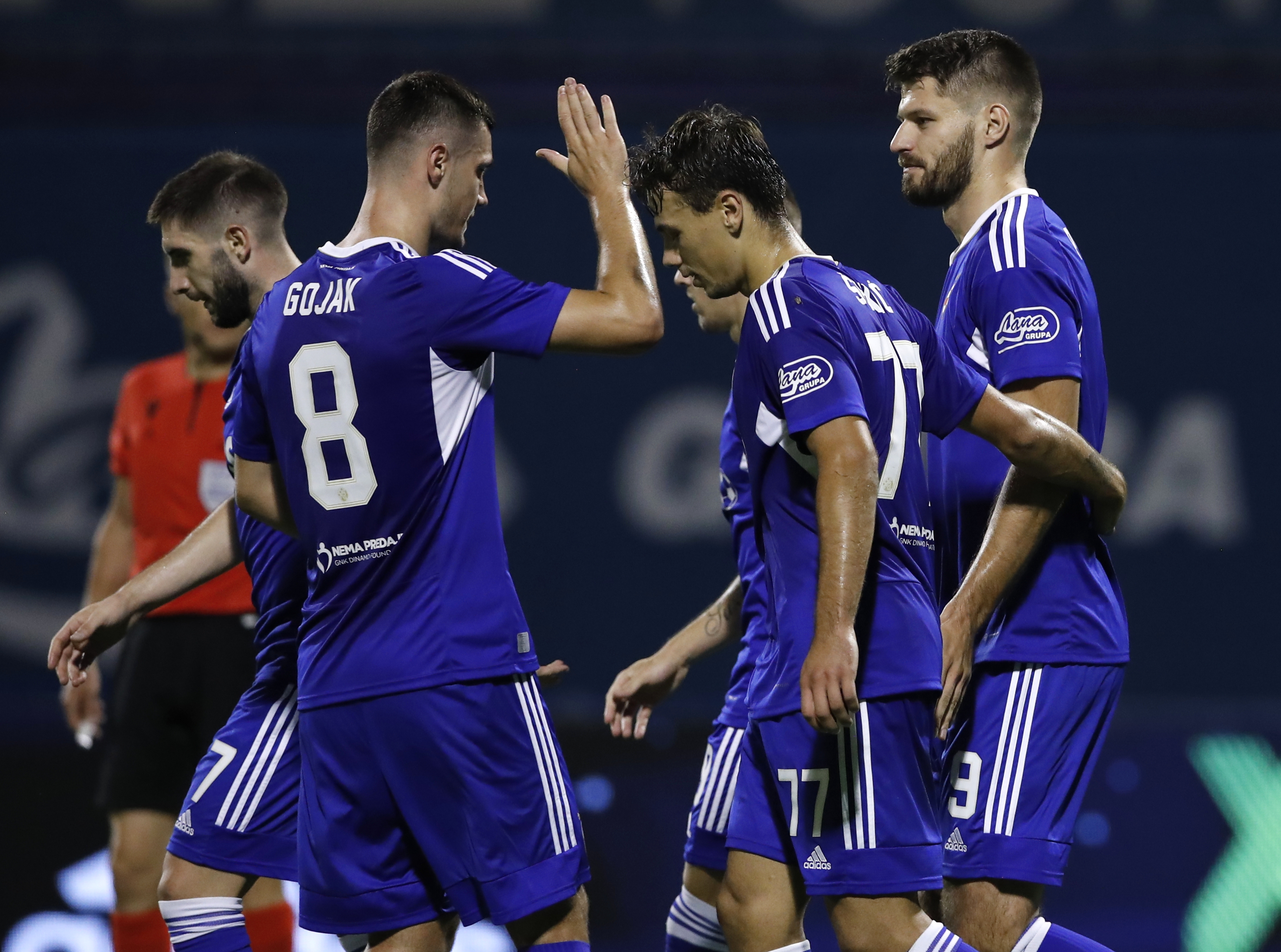 epa10113156 Dinamo's Bruno Petkovic celebrates with teammates after scoring the 4-2 during the UEFA Champions League third qualifying round, second leg match between Dinamo Zagreb and PFC Ludogorets in Zagreb, Croatia, 09 August 2022.  EPA-EFE/ANTONIO BAT