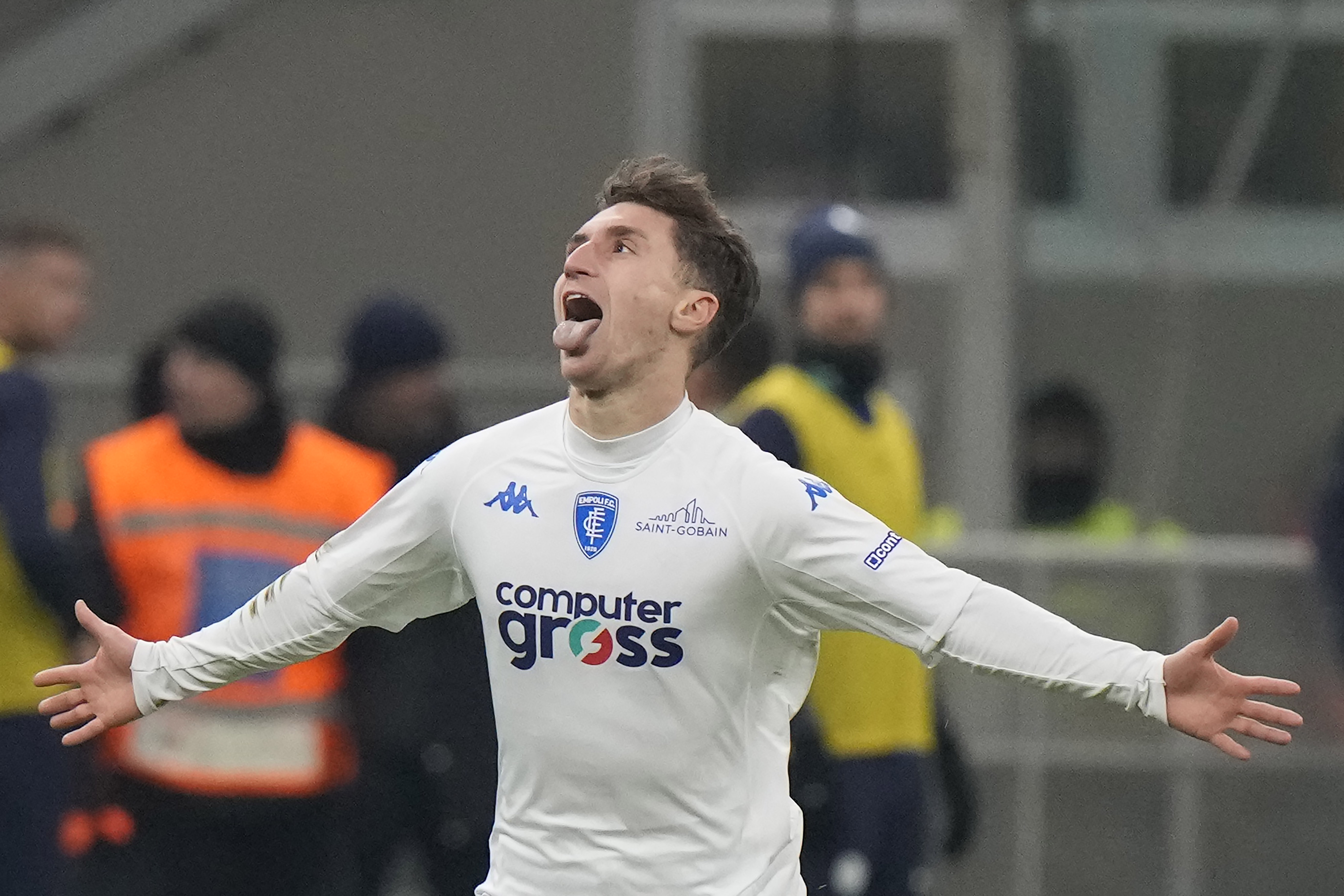 Empoli's Tommaso Baldanzi celebrates after scoring against Inter Milan during a Serie A soccer match between Inter Milan and Empoli at the San Siro stadium in Milan, Italy, Monday Jan. 23, 2023. (AP Photo/Luca Bruno)