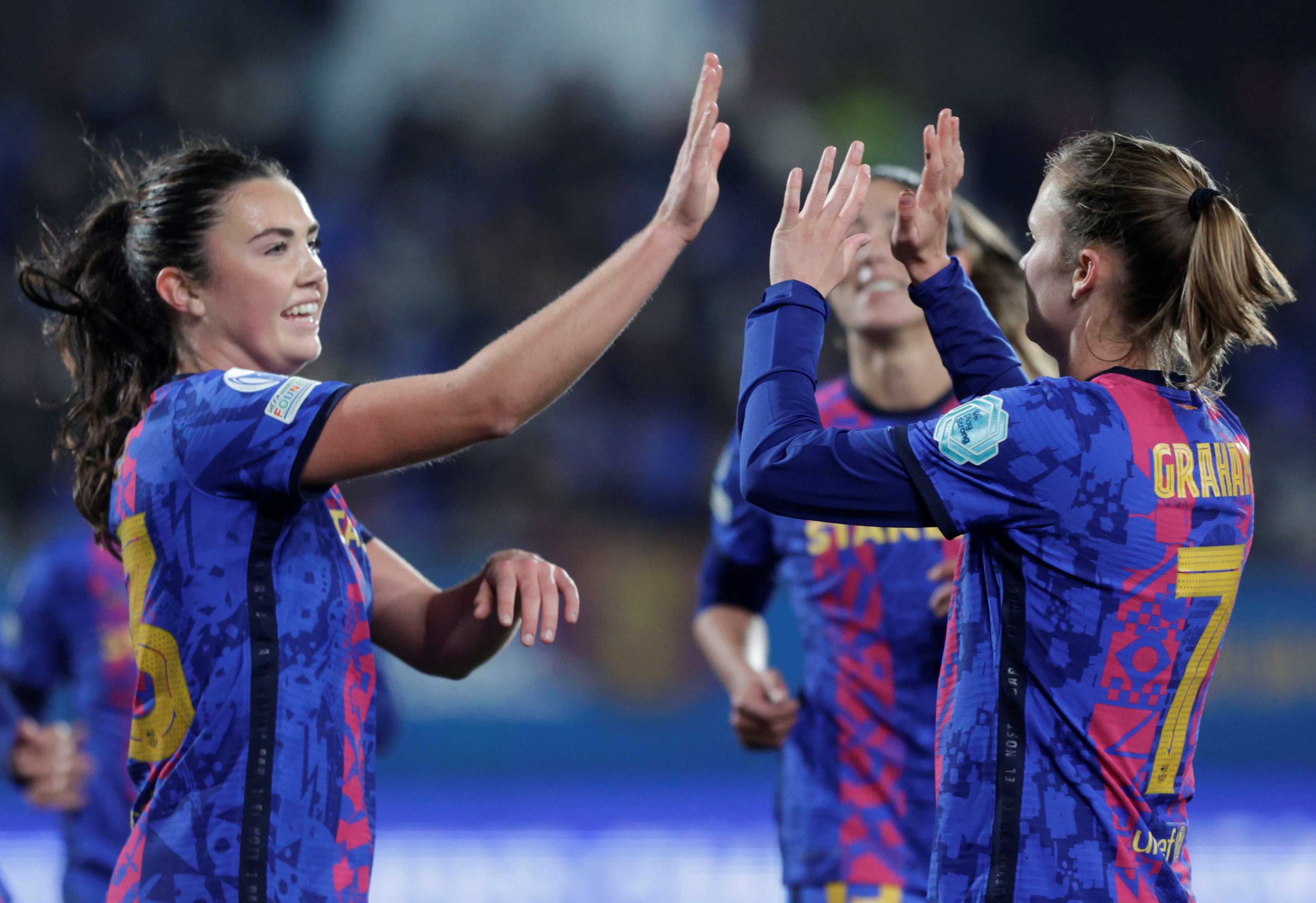 epa09644210 FC Barcelona´s players Ingrid Engen (L) and Caroline Graham (R) celebrates after scoring during the UEFA Women's Champions League match between FC Barcelona and HB Koge in Barcelona, Spain, 15 December 2021.  EPA-EFE/Quique Garcia