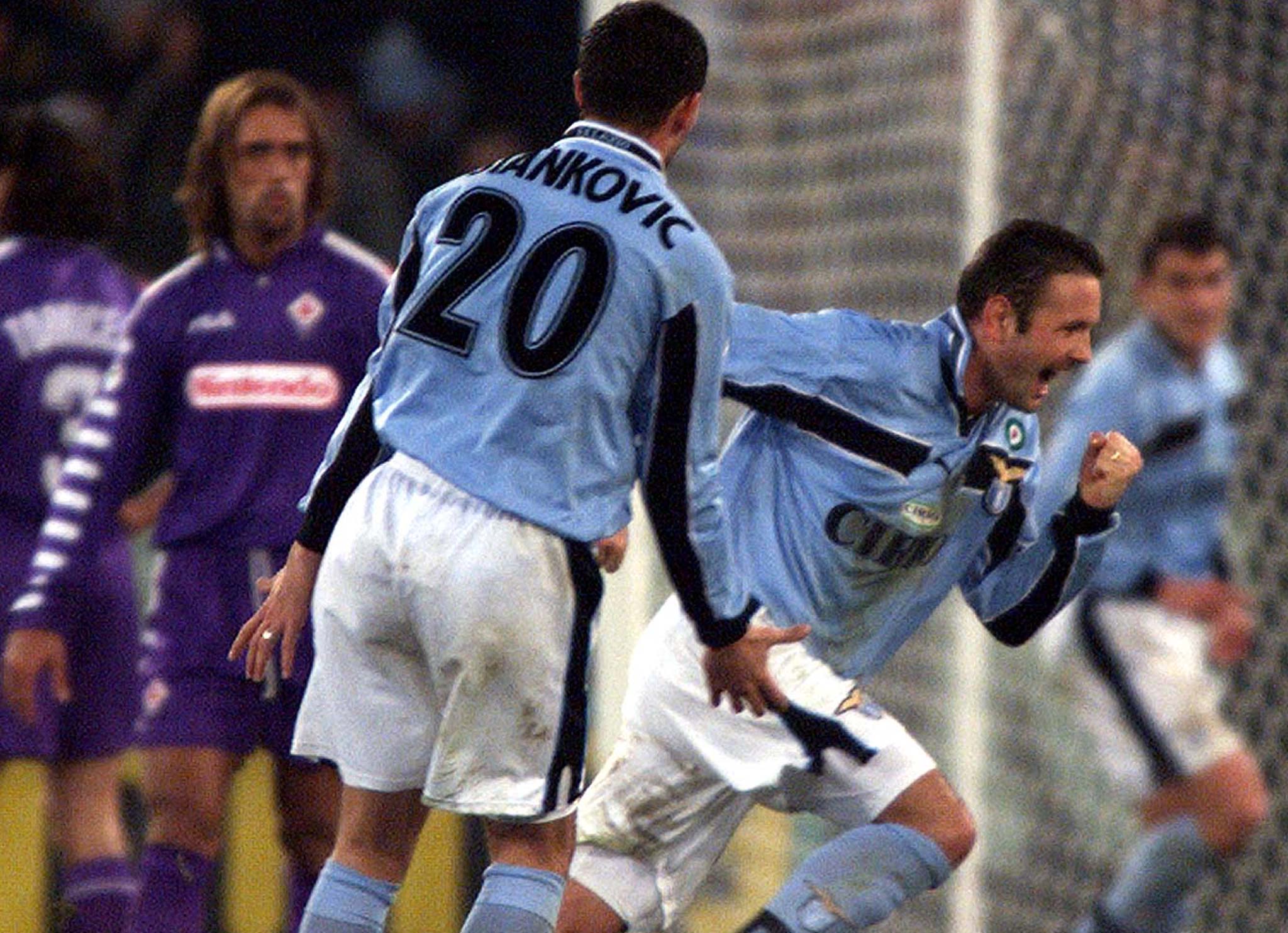 LAZIO'S YUGOSLAV PLAYER SINISA MIHAJLOVIC CELEBRATES GOAL.
