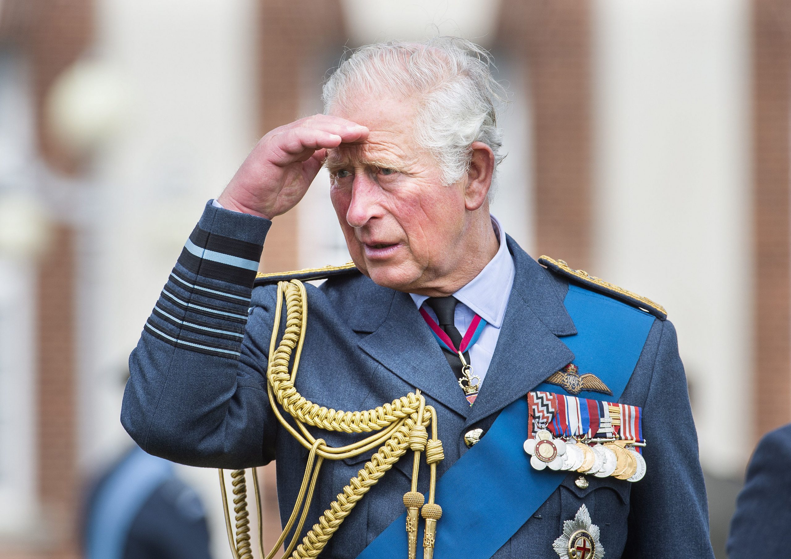 Britain's Prince Charles talks to graduates after attending the Graduation Ceremony of the Queen's Squadron at RAF College Cranwell, Lincolnshire, England, Thursday, July 16, 2020. (Julian Simmonds/Pool Photo via AP)