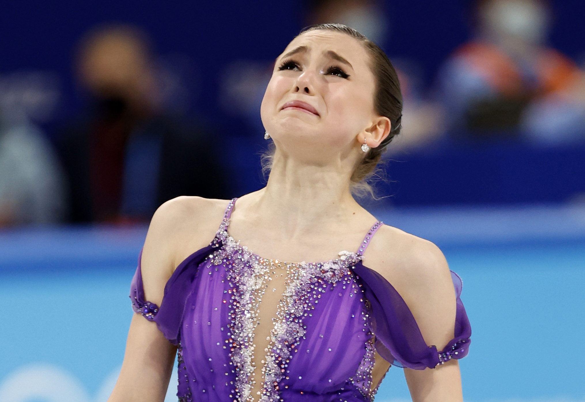 epaselect epa09759328 Kamila Valieva of Russia reacts before the Women's Short Program of the Figure Skating events at the Beijing 2022 Olympic Games, Beijing, China, 15 February 2022.  EPA-EFE/HOW HWEE YOUNG