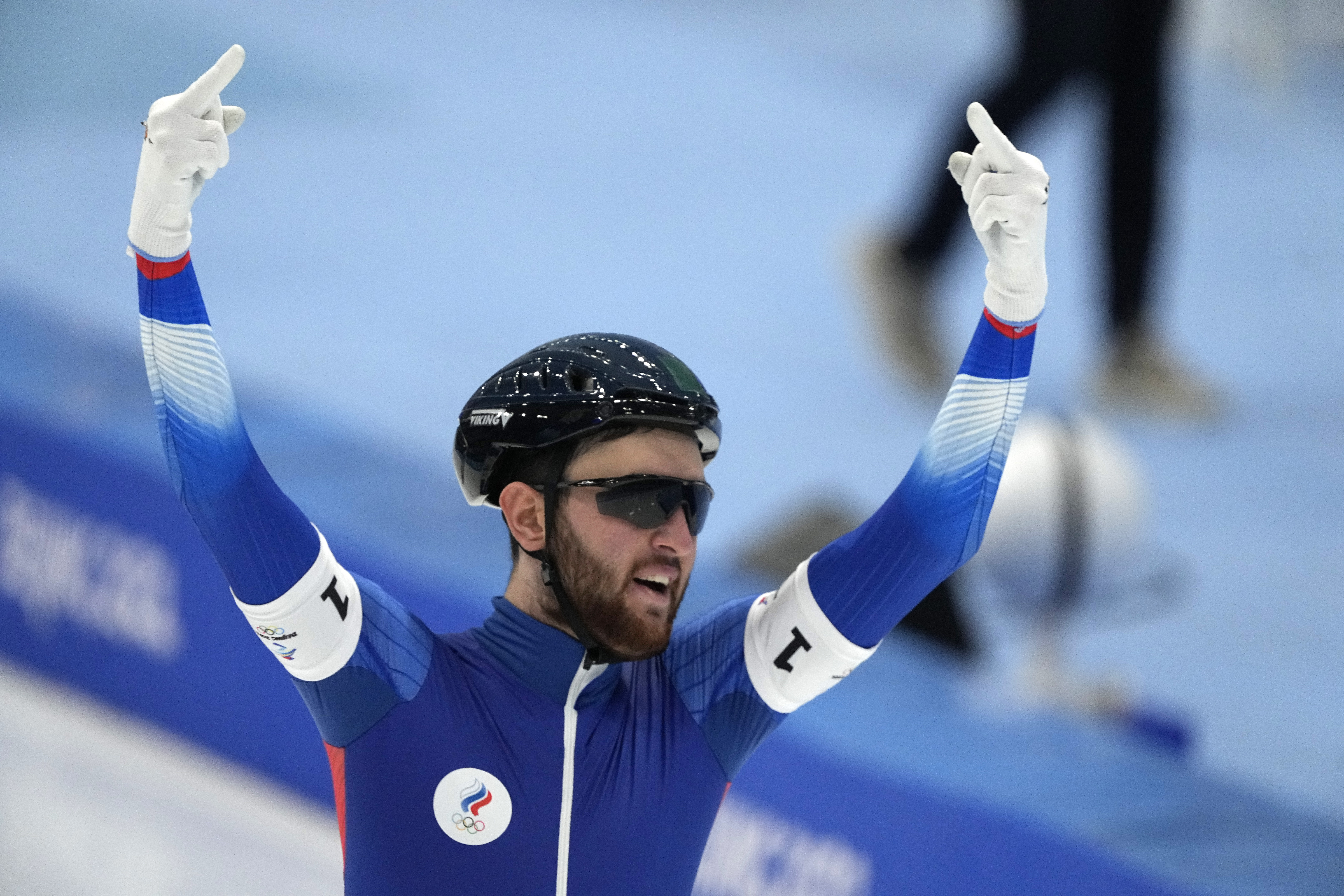 Daniil Aldoshkin of Team Russian Olympic Committee reacts after their heat in the speedskating men's team pursuit semifinals at the 2022 Winter Olympics, Tuesday, Feb. 15, 2022, in Beijing. (AP Photo/Ashley Landis)