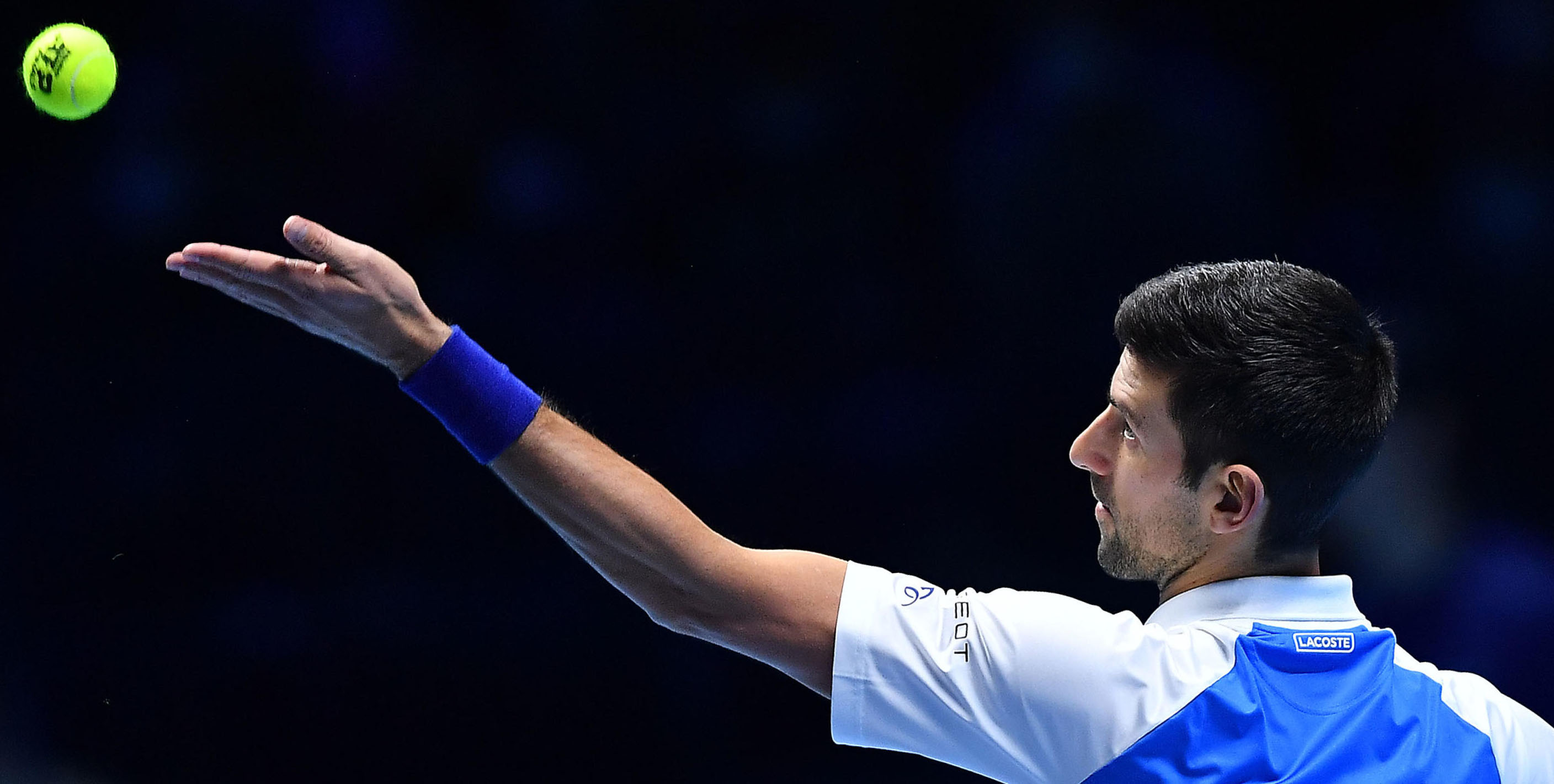 epa09592711 Novak Djokovic of Serbia in action against Cameron Norrie of Britain during their group stage match at the Nitto ATP Finals tennis tournament in Turin, Italy, 19 November 2021.  EPA-EFE/ALESSANDRO DI MARCO