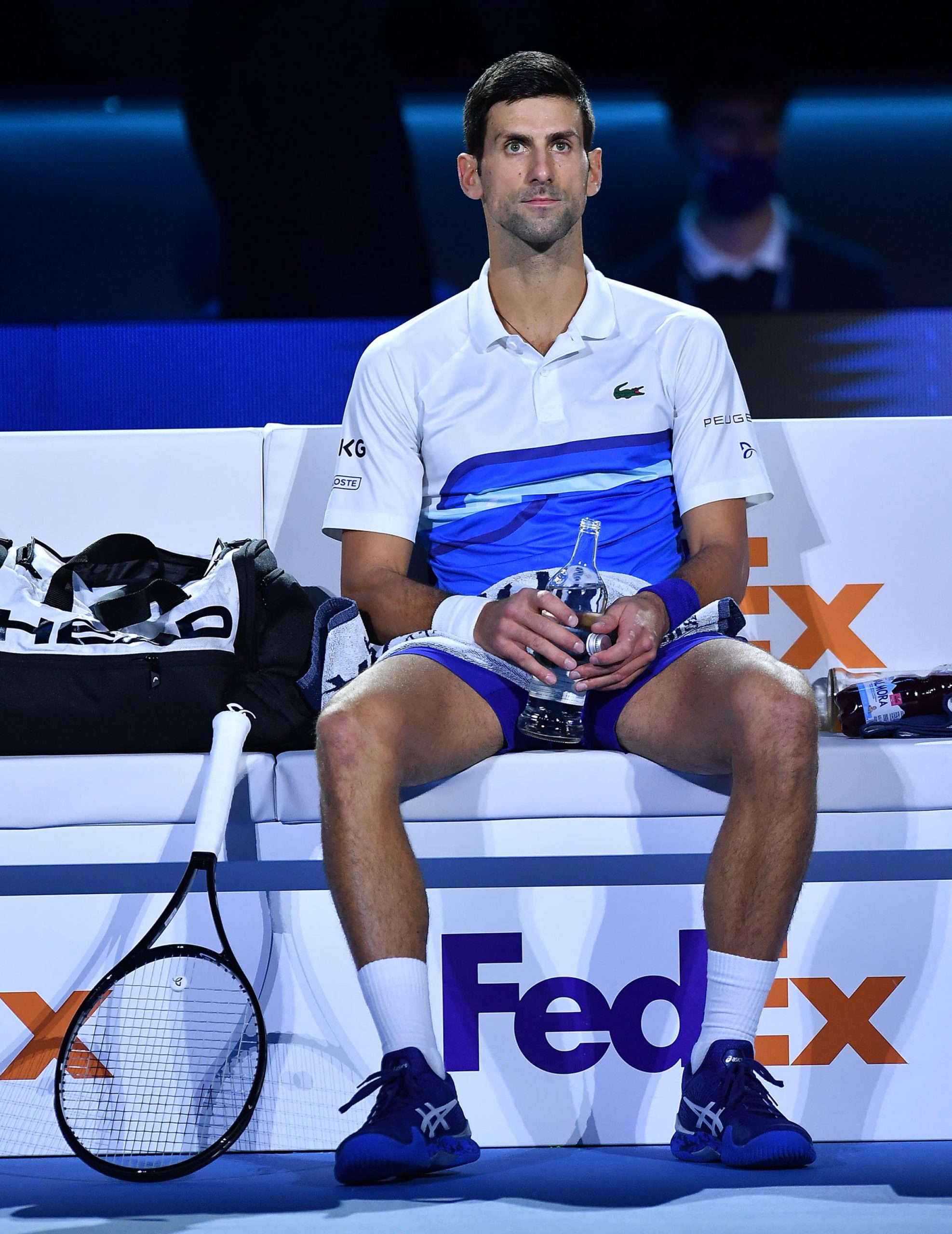 epa09594761 Novak Djokovic of Serbia reacts during a break in his semi final match against Alexander Zverev of Germany at the Nitto ATP Finals tennis tournament in Turin, Italy, 20 November 2021.  EPA-EFE/Alessandro Di Marco