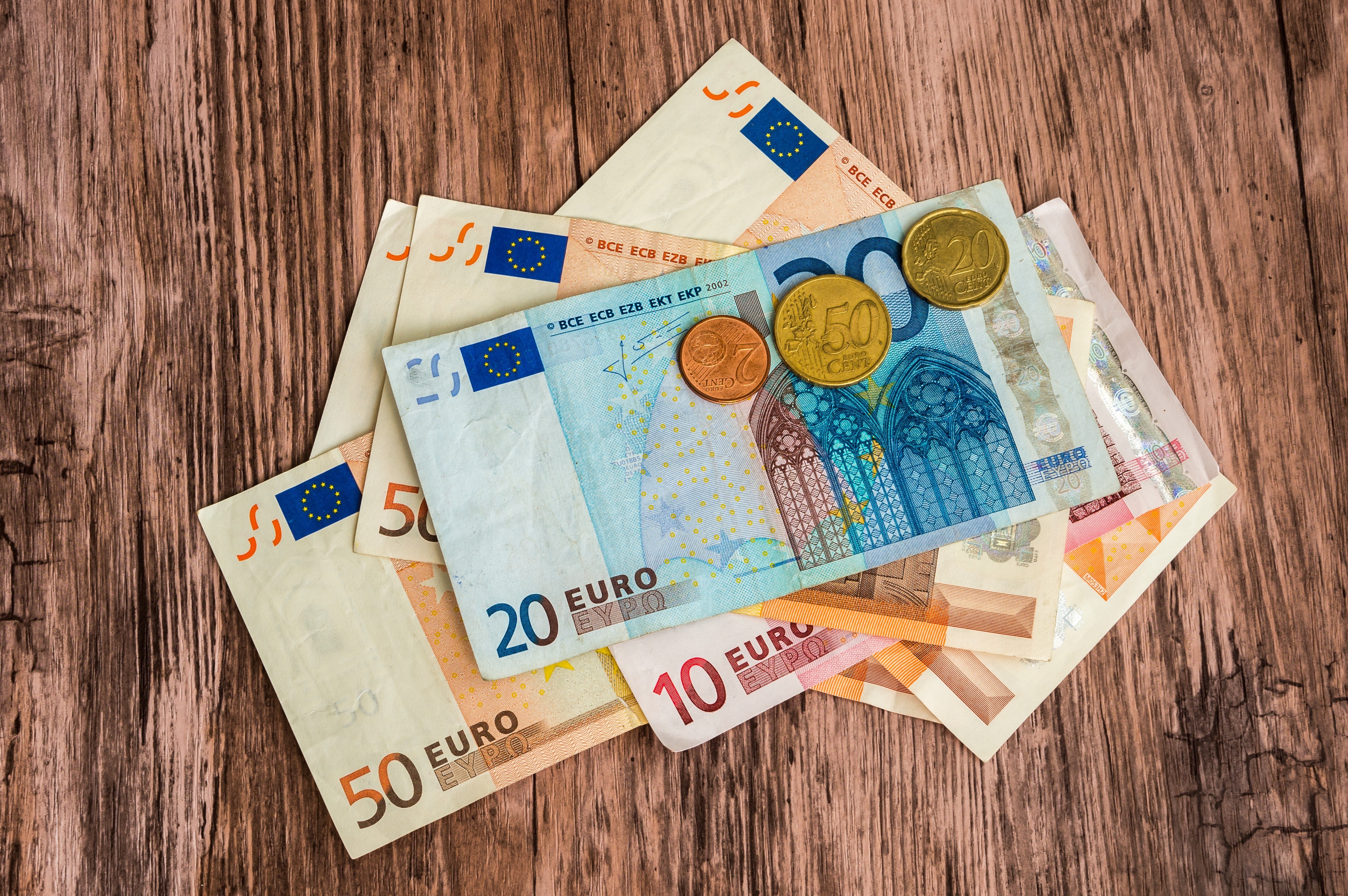 Euro,Banknotes,And,Euro,Coins
