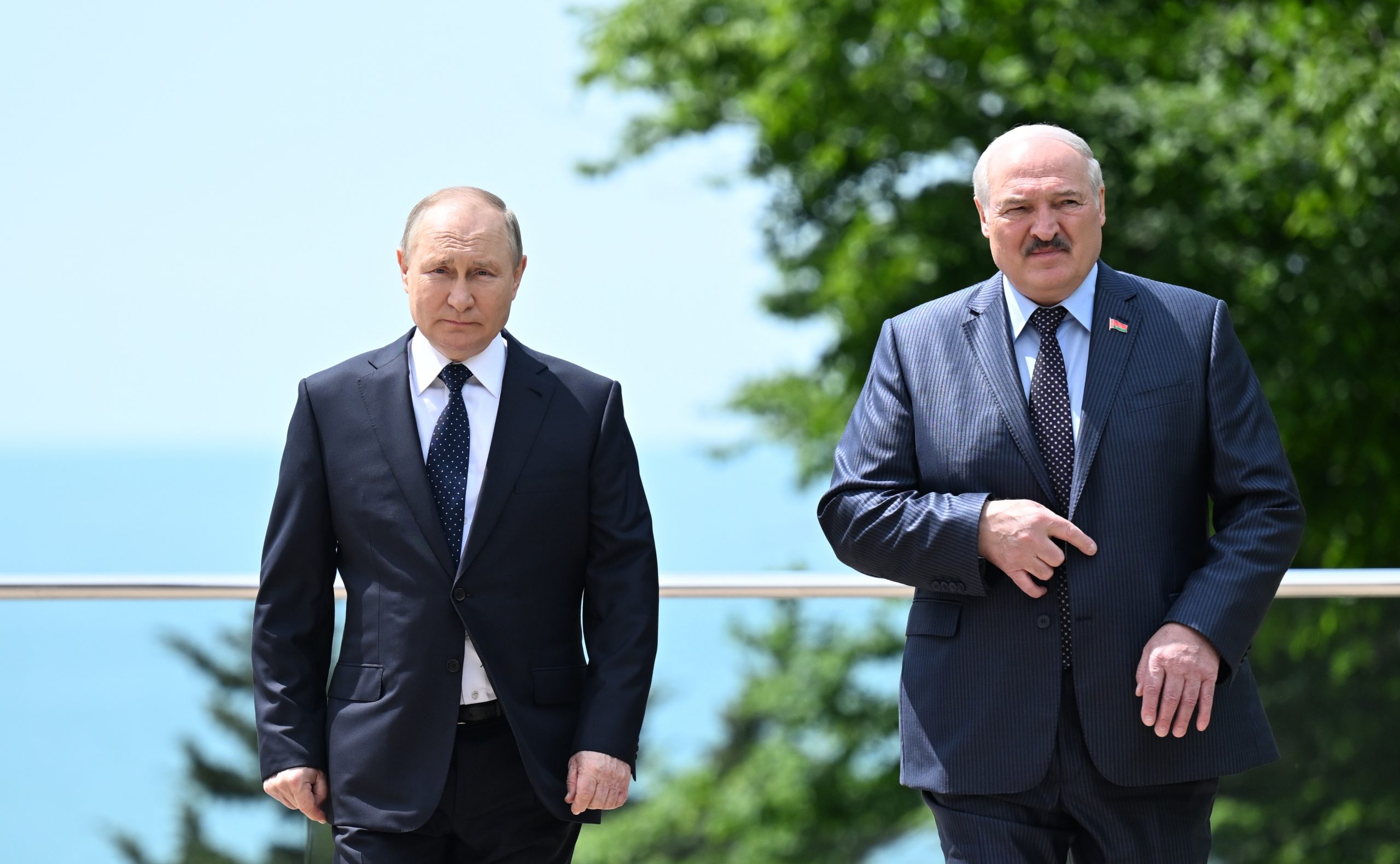 epa09969168 Russian President Vladimir Putin (L) and Belarusian President Alexander Lukashenko (R) attend a meeting at the Bocharov Ruchei residence in the resort city of Sochi, Russia, 23 May 2022.  EPA-EFE/RAMIL SITDIKOV / SPUTNIK/ KREMLIN POOL