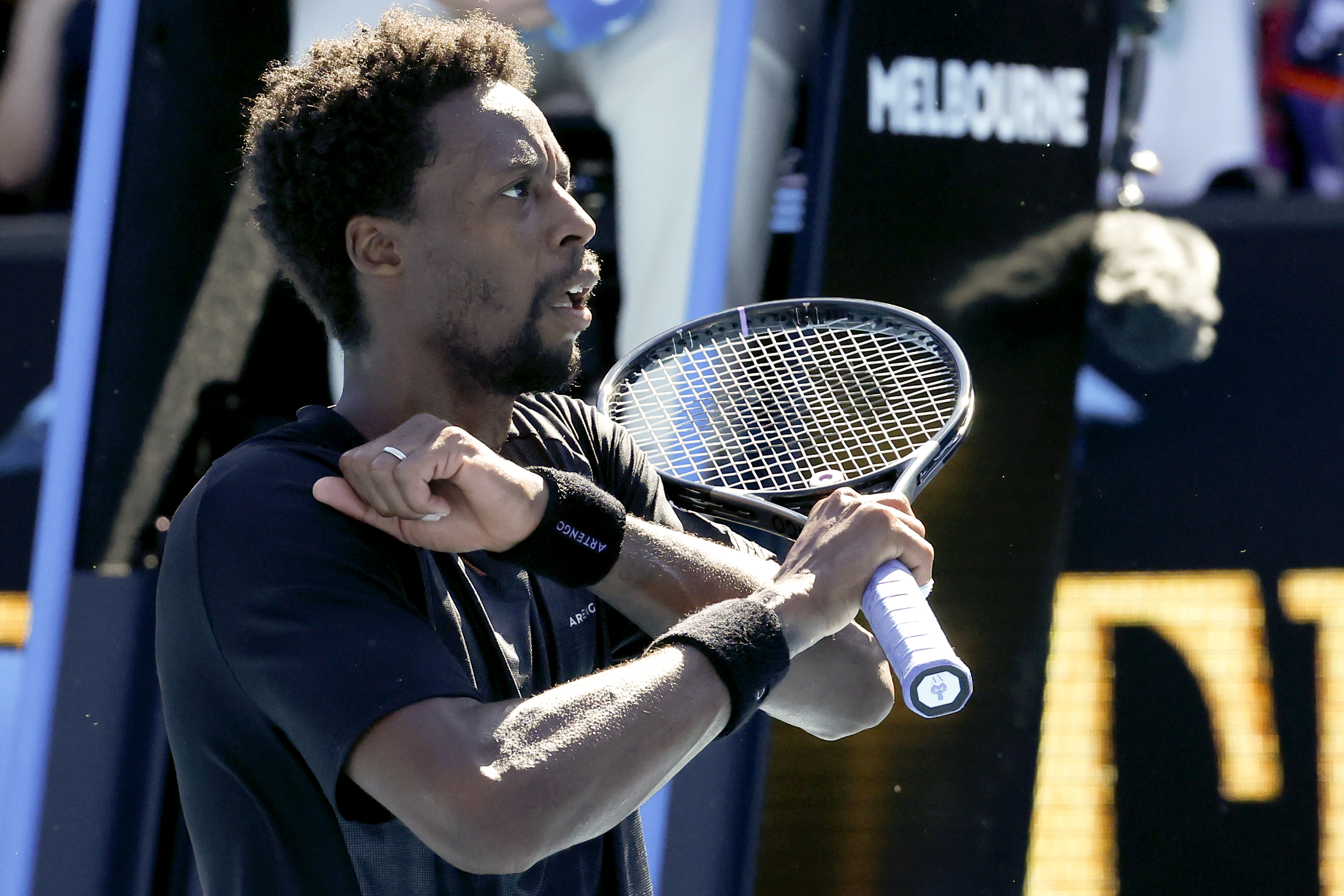 Gael Monfils of France reacts after defeating Cristian Garin of Chile in their third round match at the Australian Open tennis championships in Melbourne, Australia, Friday, Jan. 21, 2022. (AP Photo/Hamish Blair)
