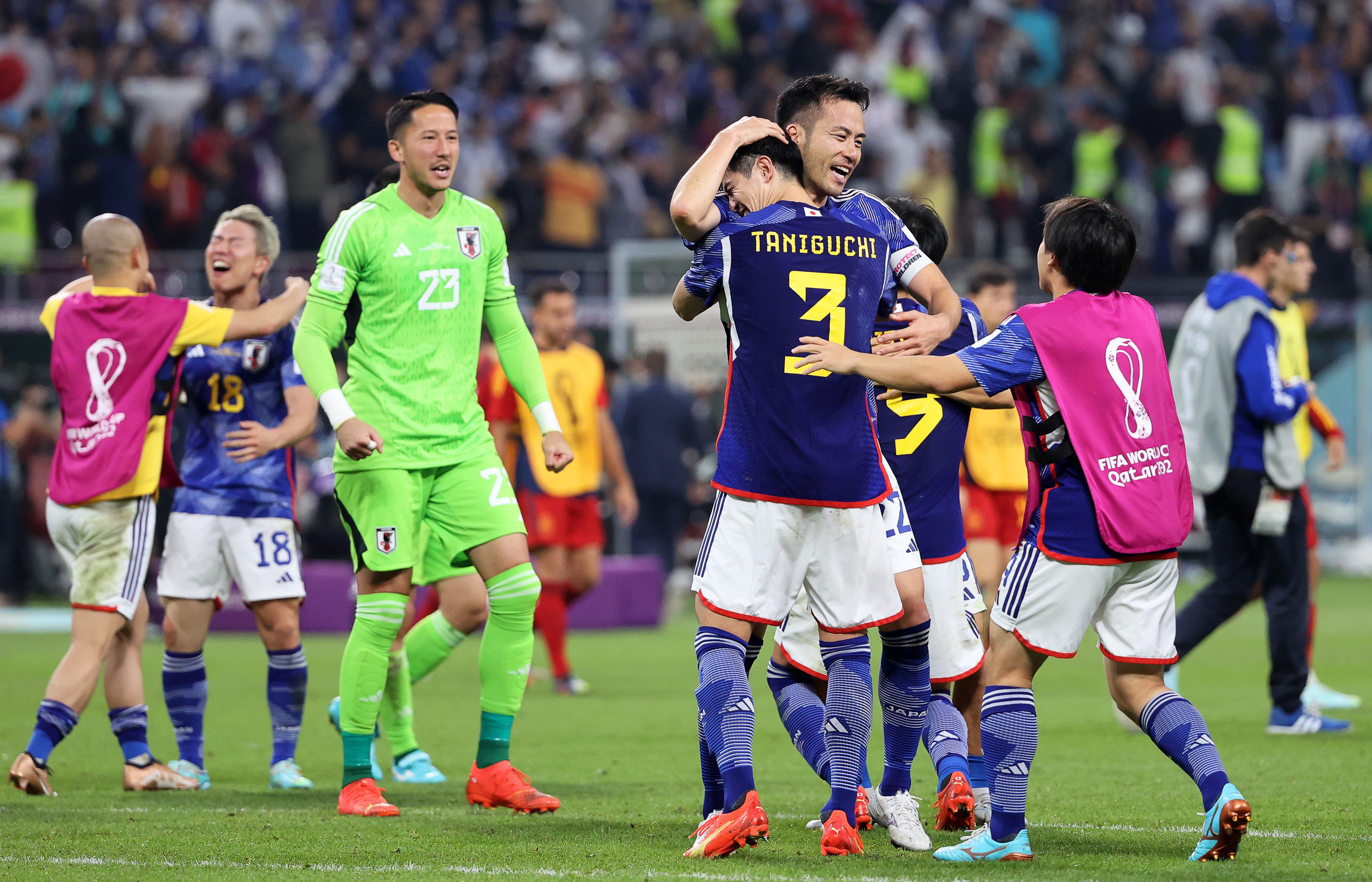 epa10343012 Players of Japan celebrate after winning the FIFA World Cup 2022 group E soccer match between Japan and Spain at Khalifa International Stadium in Doha, Qatar, 01 December 2022.  EPA-EFE/Ali Haider