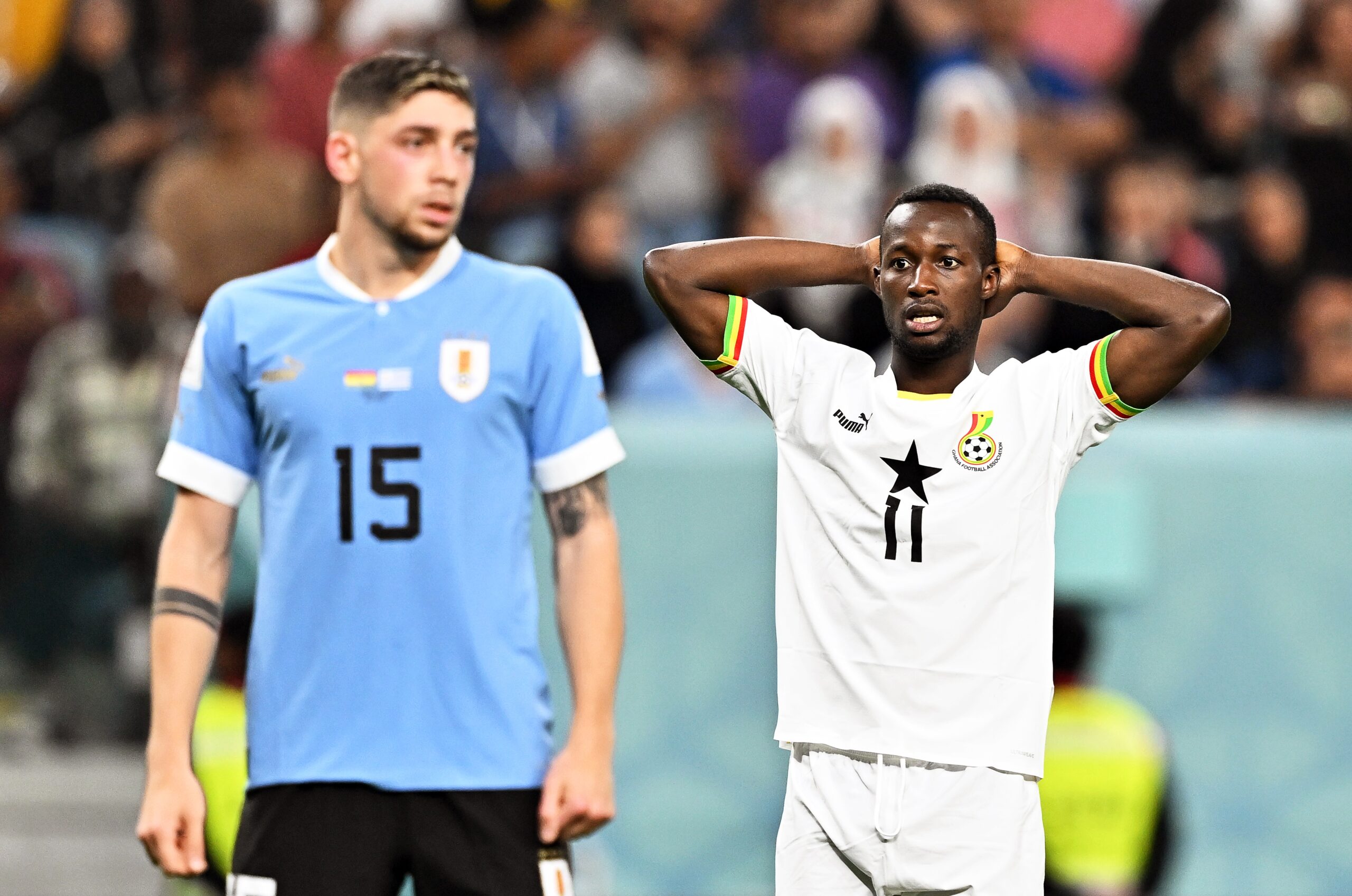 epa10344427 Osman Bukari (R) of Ghana reacts during the FIFA World Cup 2022 group H soccer match between Ghana and Uruguay at Al Janoub Stadium in Al Wakrah, Qatar, 02 December 2022.  EPA-EFE/Noushad Thekkayil