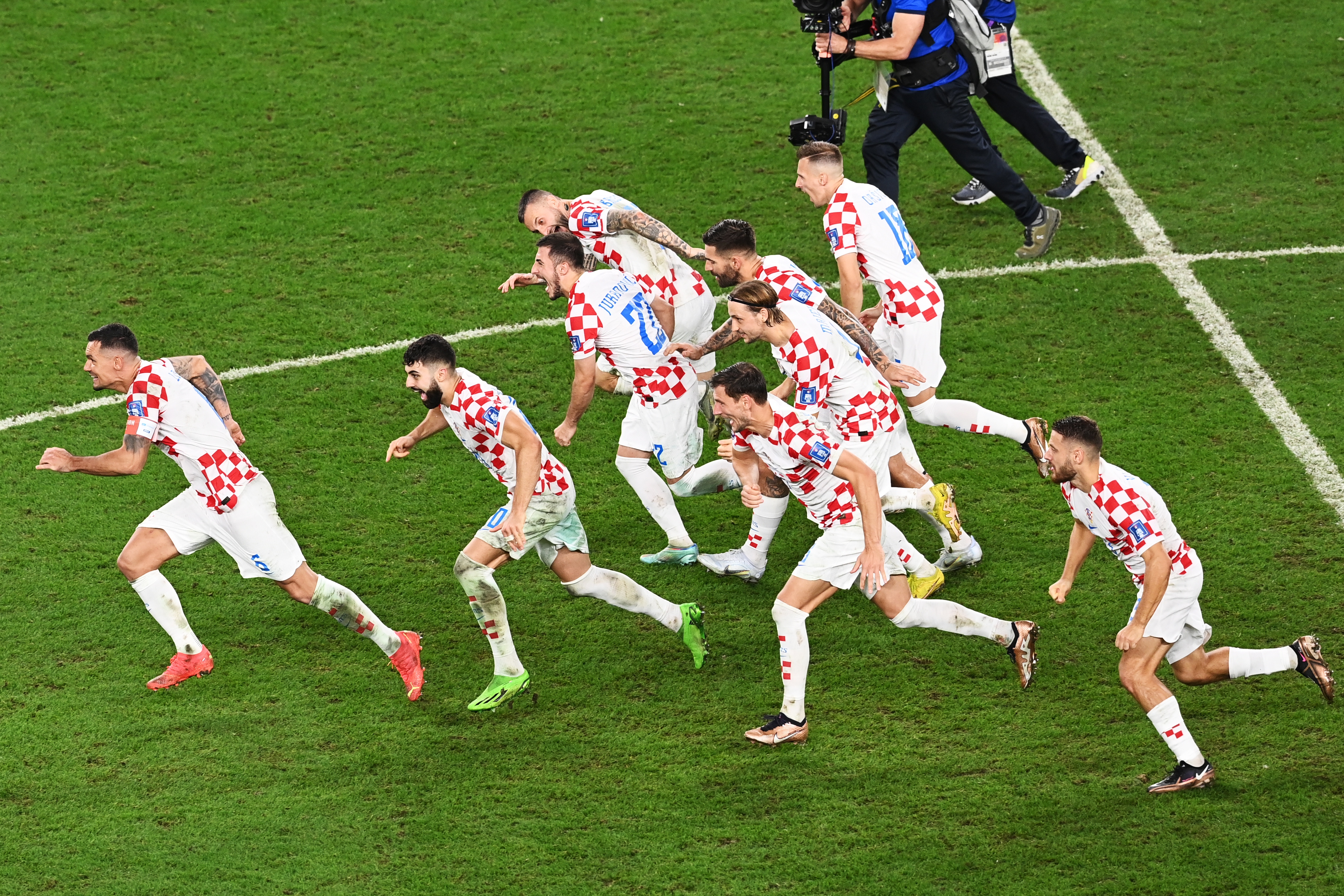 epa10350103 Players of Croatia react after the penalty shots during the FIFA World Cup 2022 round of 16 soccer match between Japan and Croatia at Al Janoub Stadium in Al Wakrah, Qatar, 05 December 2022.  EPA-EFE/Georgi Licovski