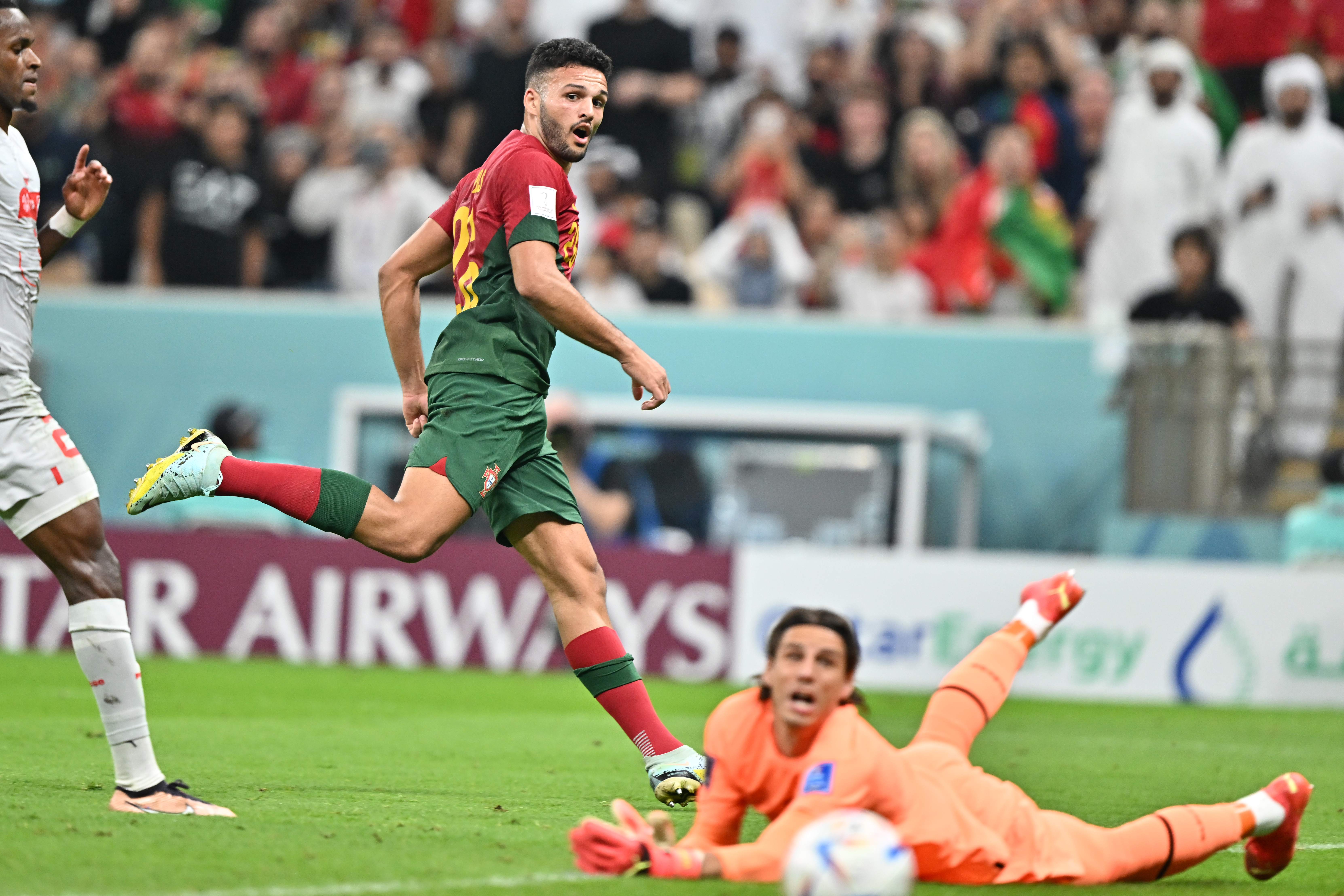 epa10352718 Goncalo Ramos (C) of Portugal in action during the FIFA World Cup 2022 round of 16 soccer match between Portugal and Switzerland at Lusail Stadium in Lusail, Qatar, 06 December 2022.  EPA-EFE/Noushad Thekkayil