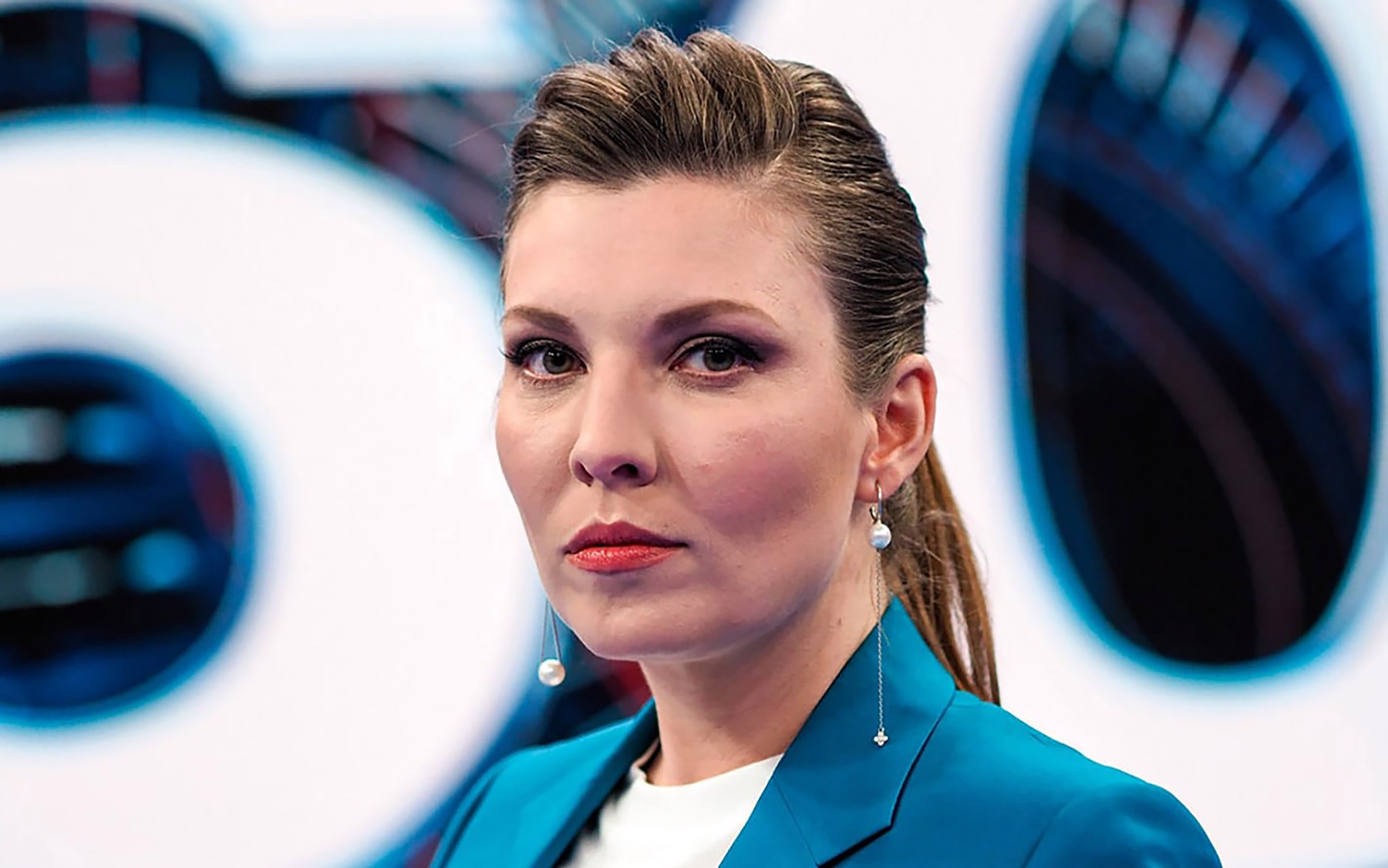 Putin's state TV propagandist Olga 'Iron Doll' Skabeyeva shows fake footage 'of Queen humiliating Africans'