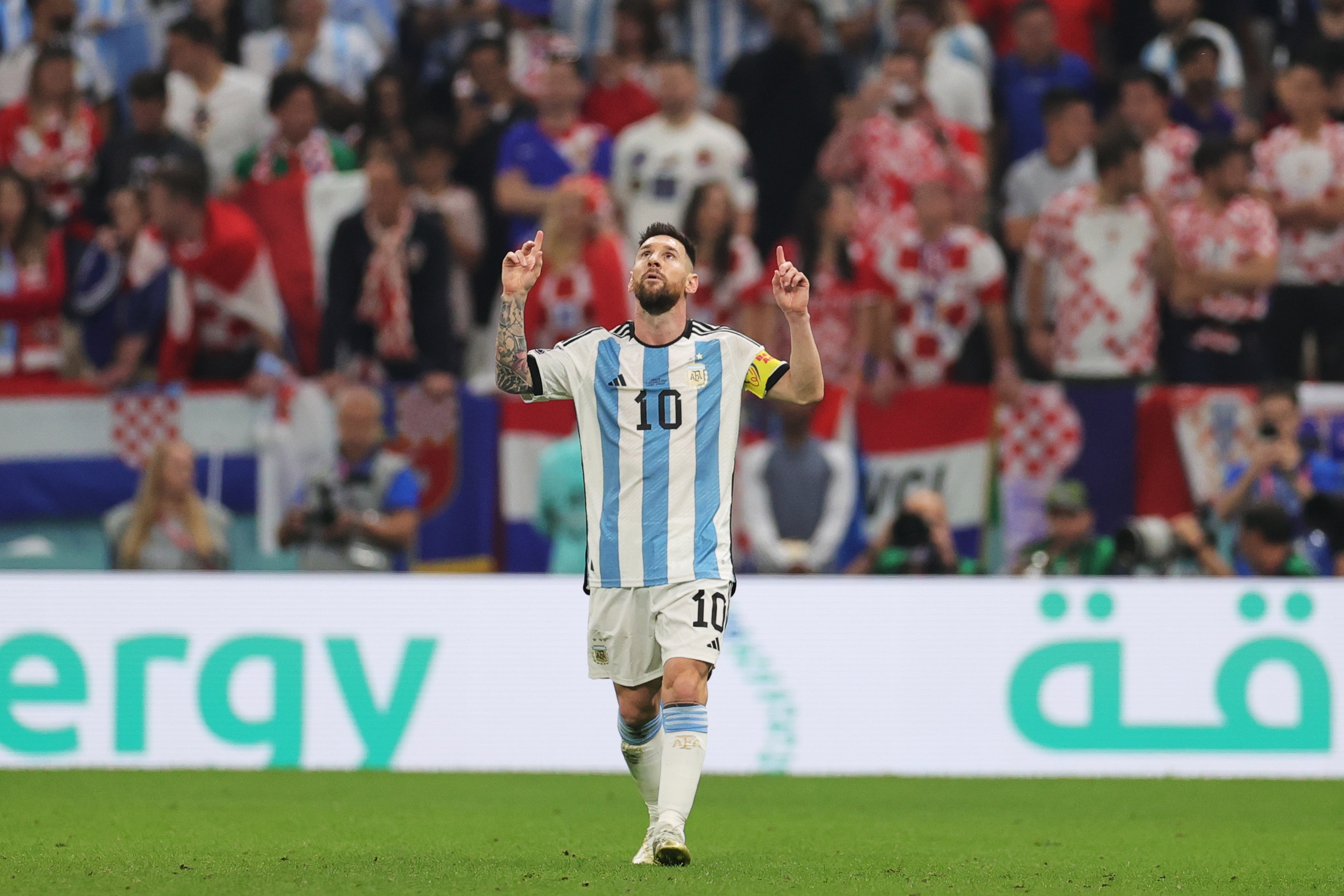 epa10364030 Lionel Messi of Argentina gestures after scoring the 1-0 goal from the penalty spot during the FIFA World Cup 2022 semi final between Argentina and Croatia at Lusail Stadium in Lusail, Qatar, 13 December 2022.  EPA-EFE/Friedemann Vogel