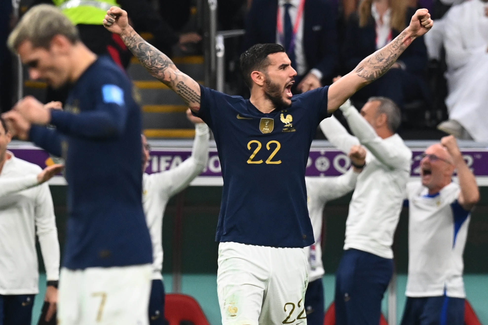 epa10366363 Theo Hernandez (C) of France and teammates celebrate after winning the FIFA World Cup 2022 semi final between France and Morocco at Al Bayt Stadium in Al Khor, Qatar, 14 December 2022.  EPA-EFE/Georgi Licovski