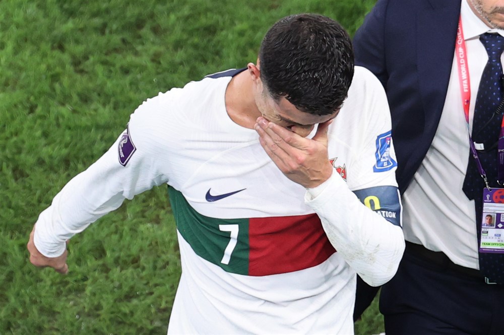 epa10359616 Cristiano Ronaldo of Portugal reacts as he leaves the pitch after the FIFA World Cup 2022 quarter final soccer match between Morocco and Portugal at Al Thumama Stadium in Doha, Qatar, 10 December 2022.  EPA-EFE/Abedin Taherkenareh
