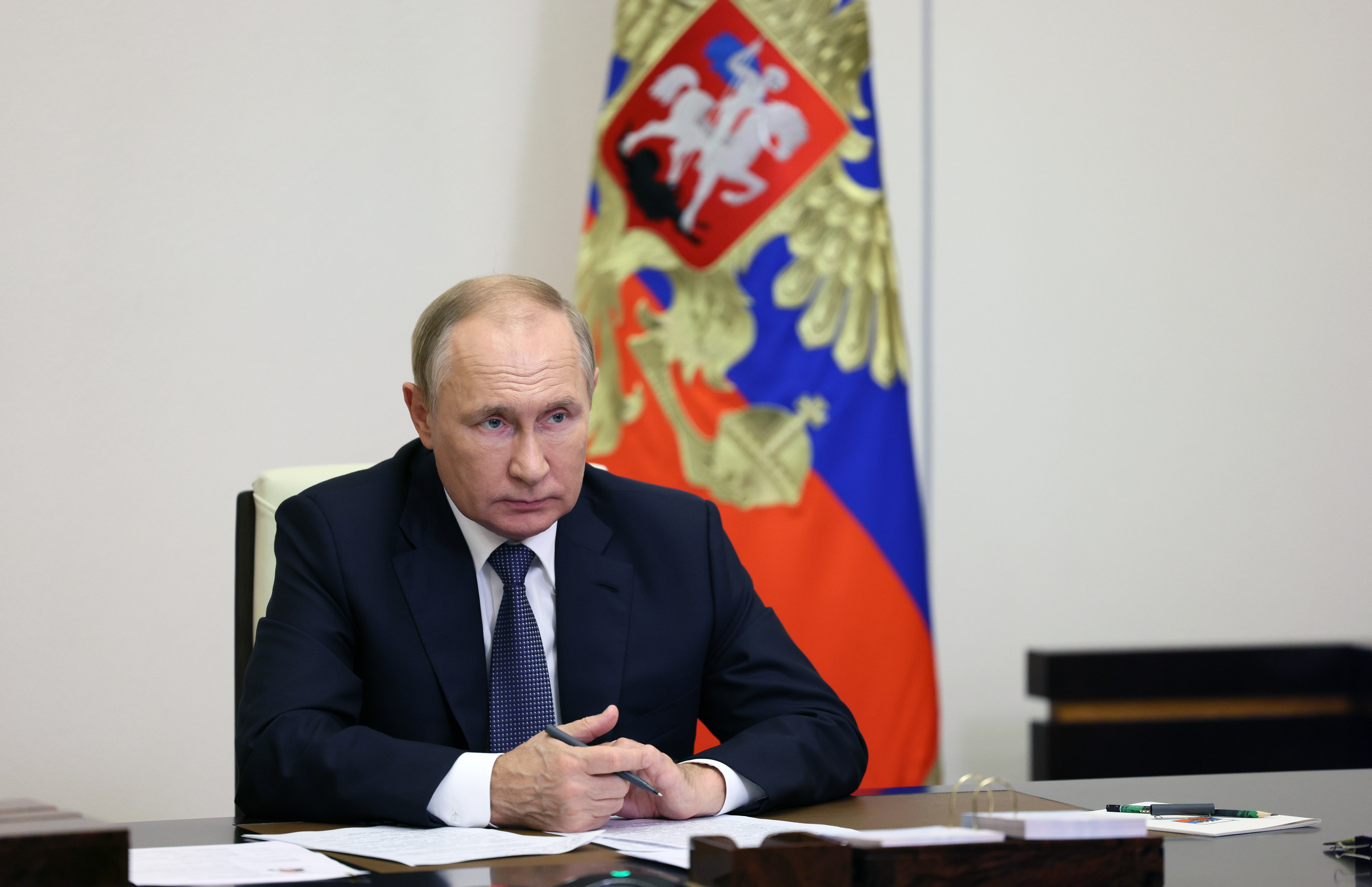 Russian President Putin attends a meeting with governor of Magadan region via a video conference