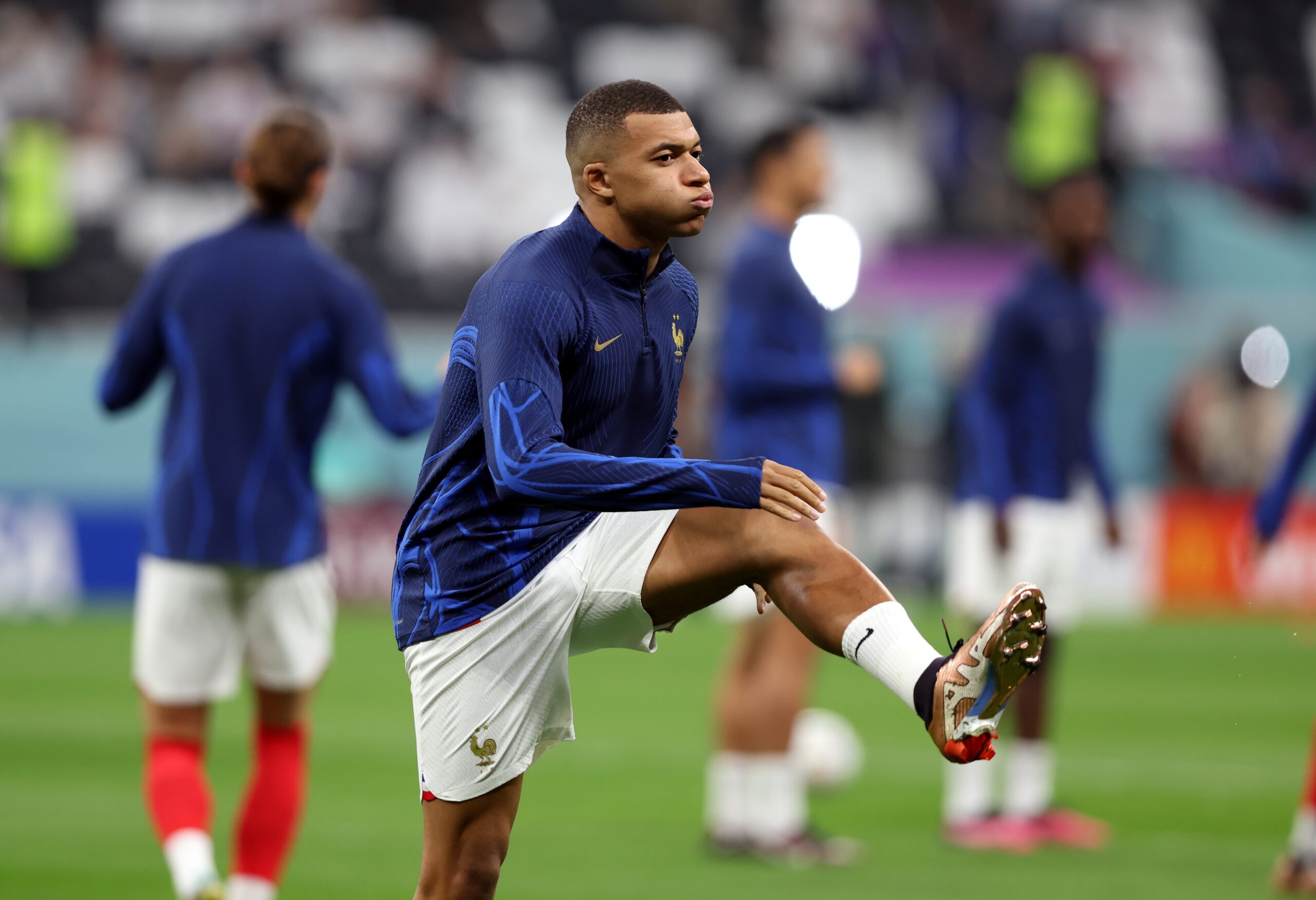 epa10359837 Kylian Mbappe of France warms up prior to the FIFA World Cup 2022 quarter final soccer match between England and France at Al Bayt Stadium in Al Khor, Qatar, 10 December 2022.  EPA-EFE/Tolga Bozoglu
