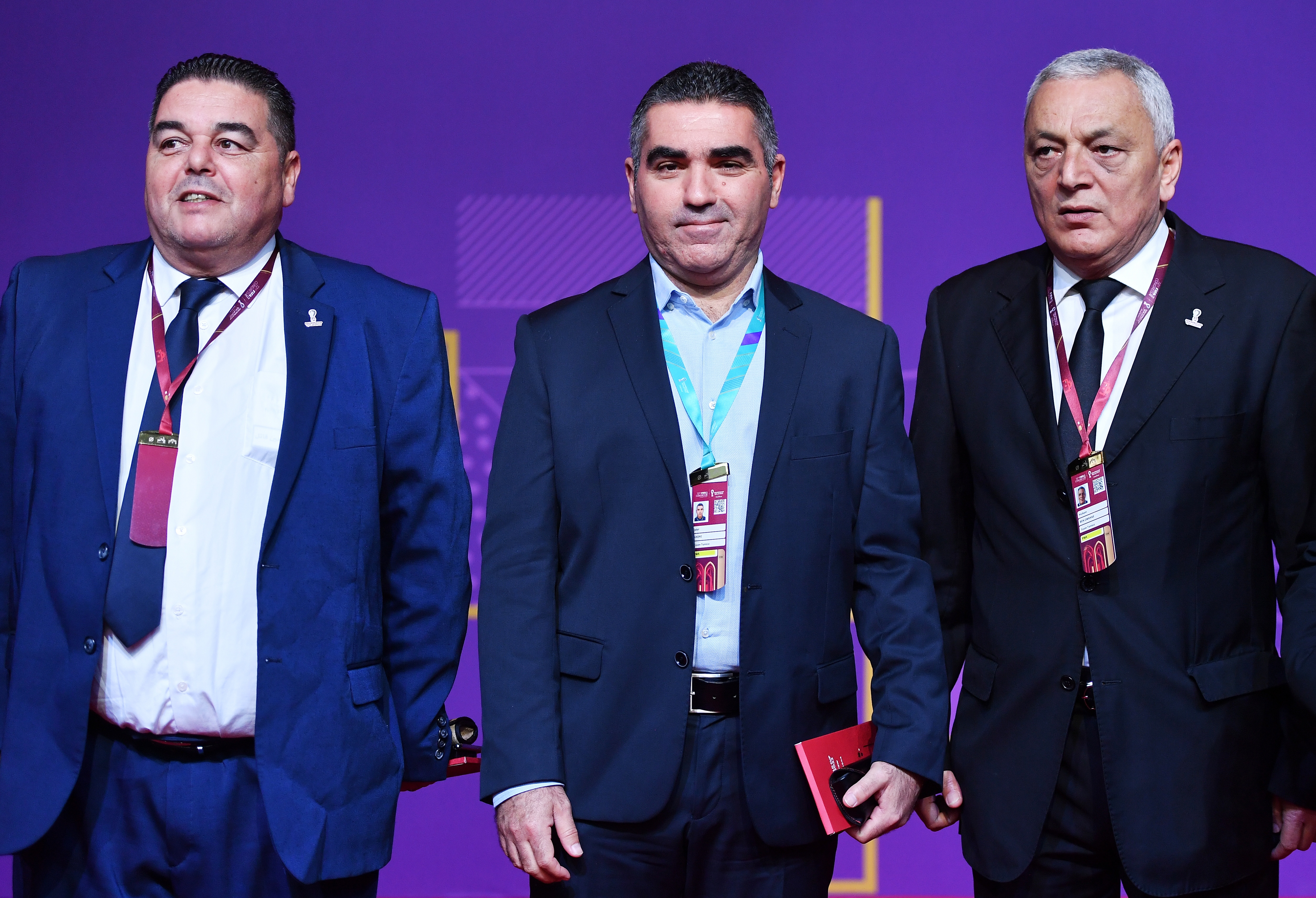 epa09863795 Coach of the Tunisian national soccer team Jalel Kadri (C) and Hichem Ben Omrane (R), head of Tunisia's national teams committee, arrive for the main draw for the FIFA World Cup 2022 in Doha, Qatar, 01 April 2022.  EPA-EFE/NOUSHAD THEKKAYIL