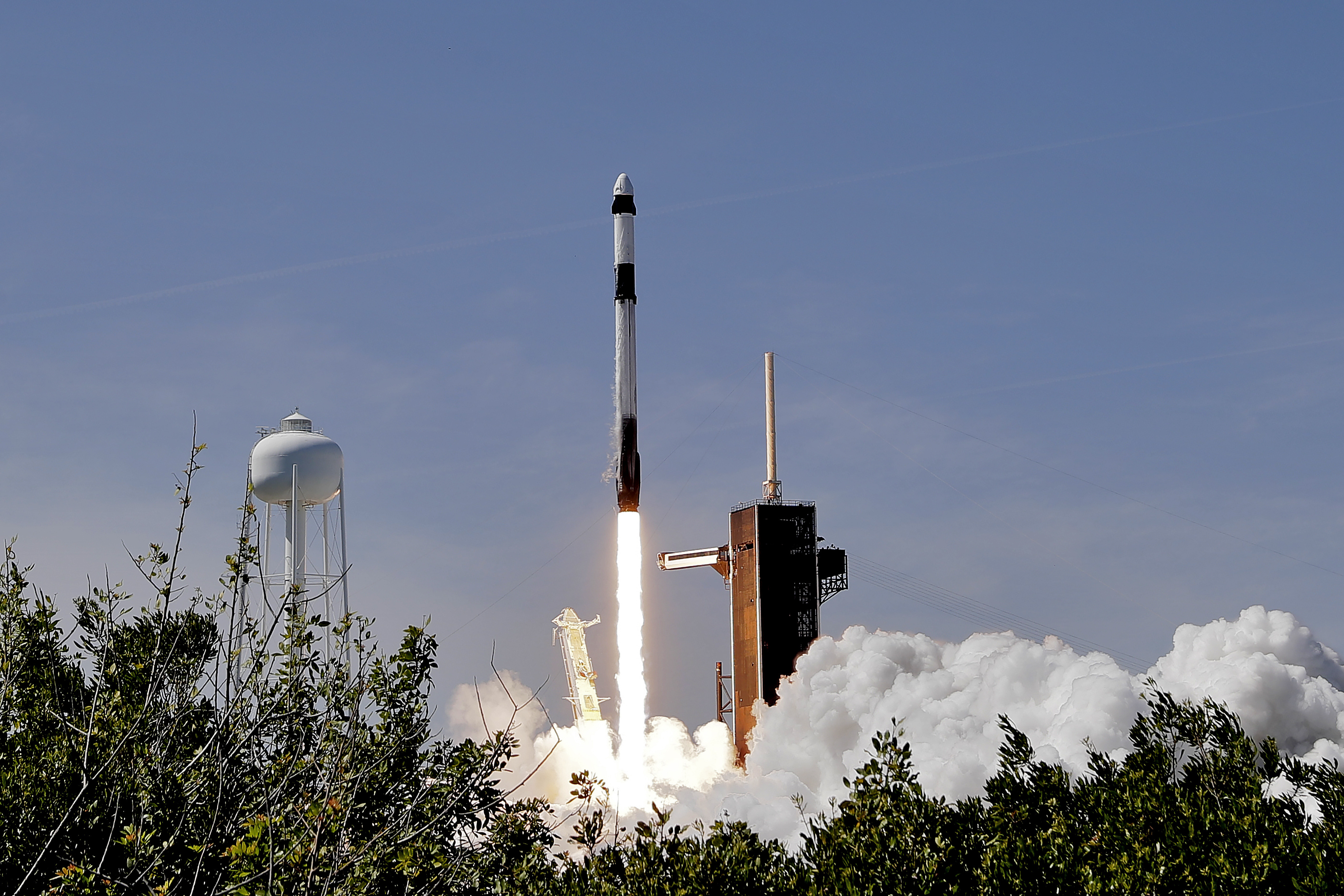 A SpaceX Falcon 9 rocket with the Crew Dragon capsule attached, lifts off with the first private crew from Launch Complex 39A Friday, April 8, 2022, at the Kennedy Space Center in Cape Canaveral, Fla. . (AP Photo/Chris O'Meara)