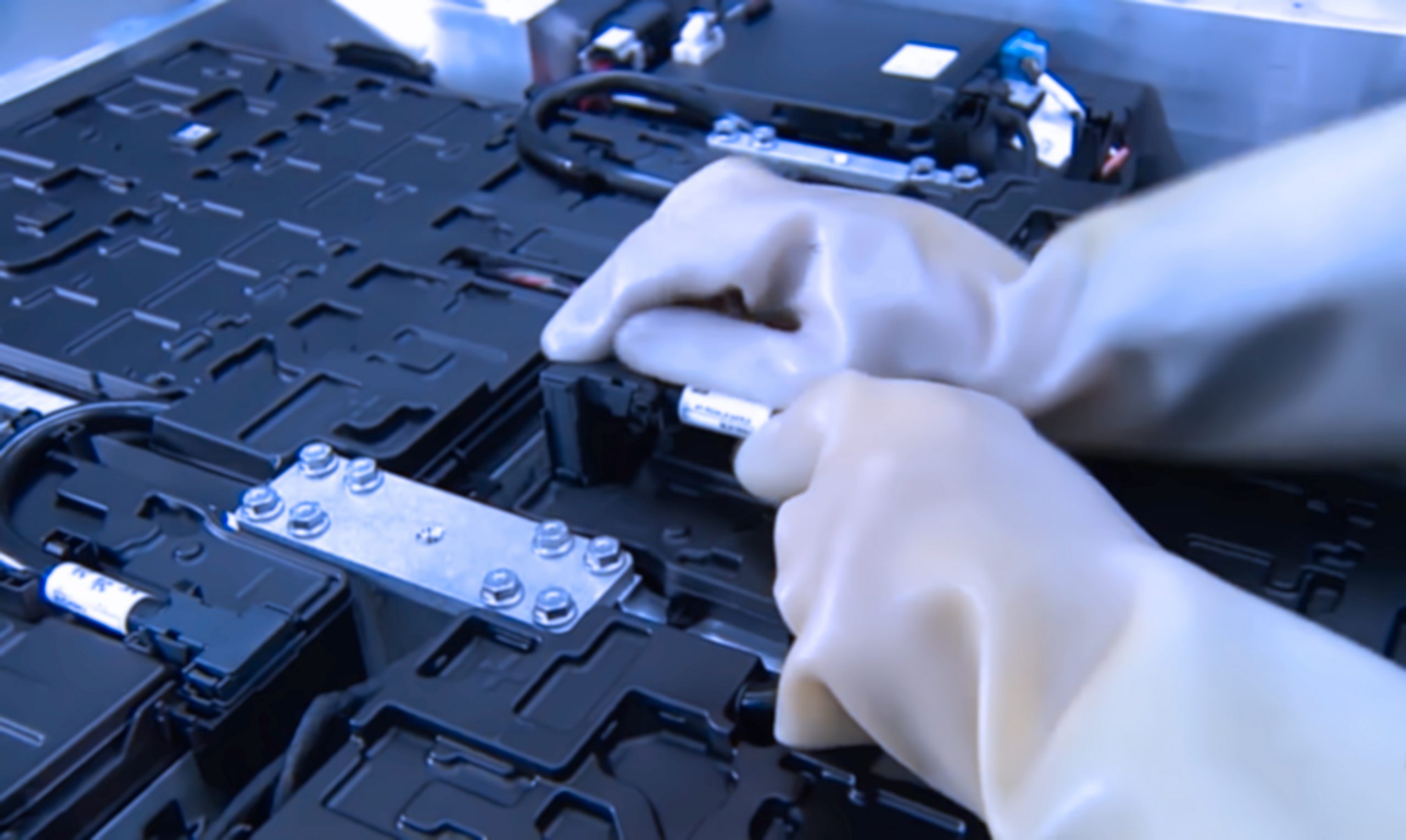 Abstract, blurry, bokeh background, image for the background. Manufacture of batteries for hybrid cars