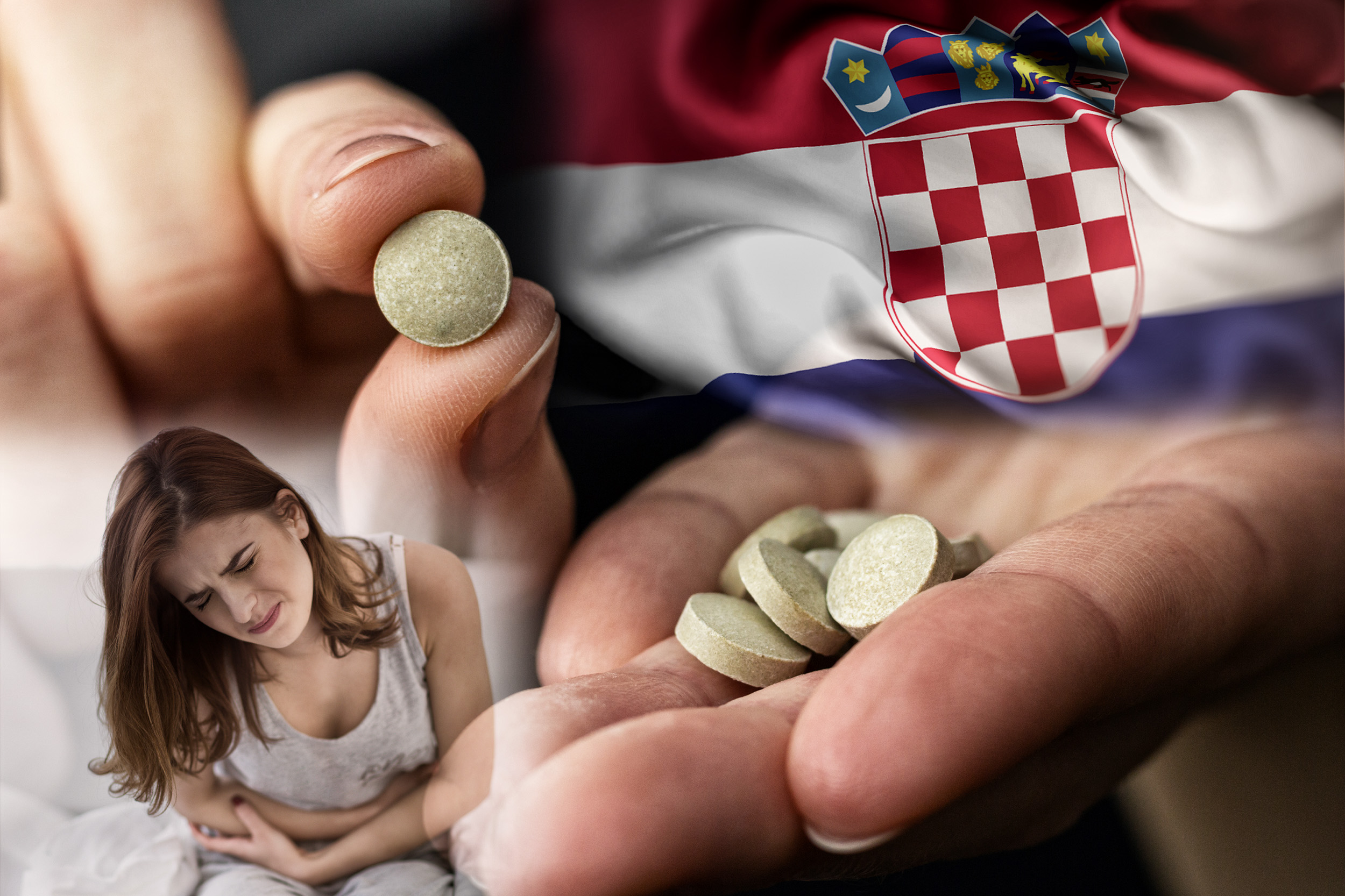 Closeup of a woman holding an iodine pill.