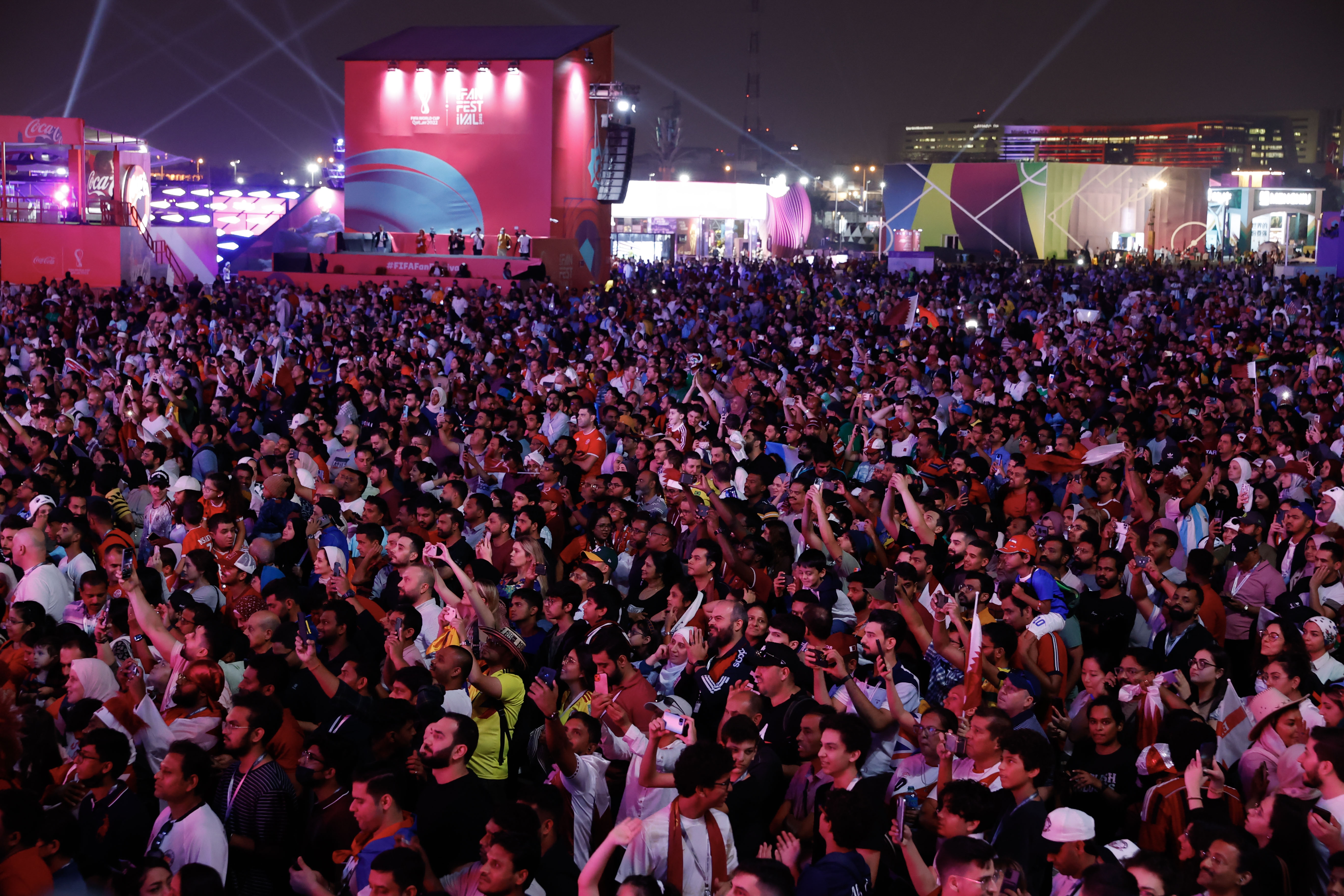 epa10316212 Fans gather to view the opening ceremony and match at the FIFA World Cup 2022 Fan Festival in Doha, Qatar 20 November 2022. The World Cup 2022 opens with the first match between Qatar and Equador.  EPA-EFE/ROLEX DELA PENA