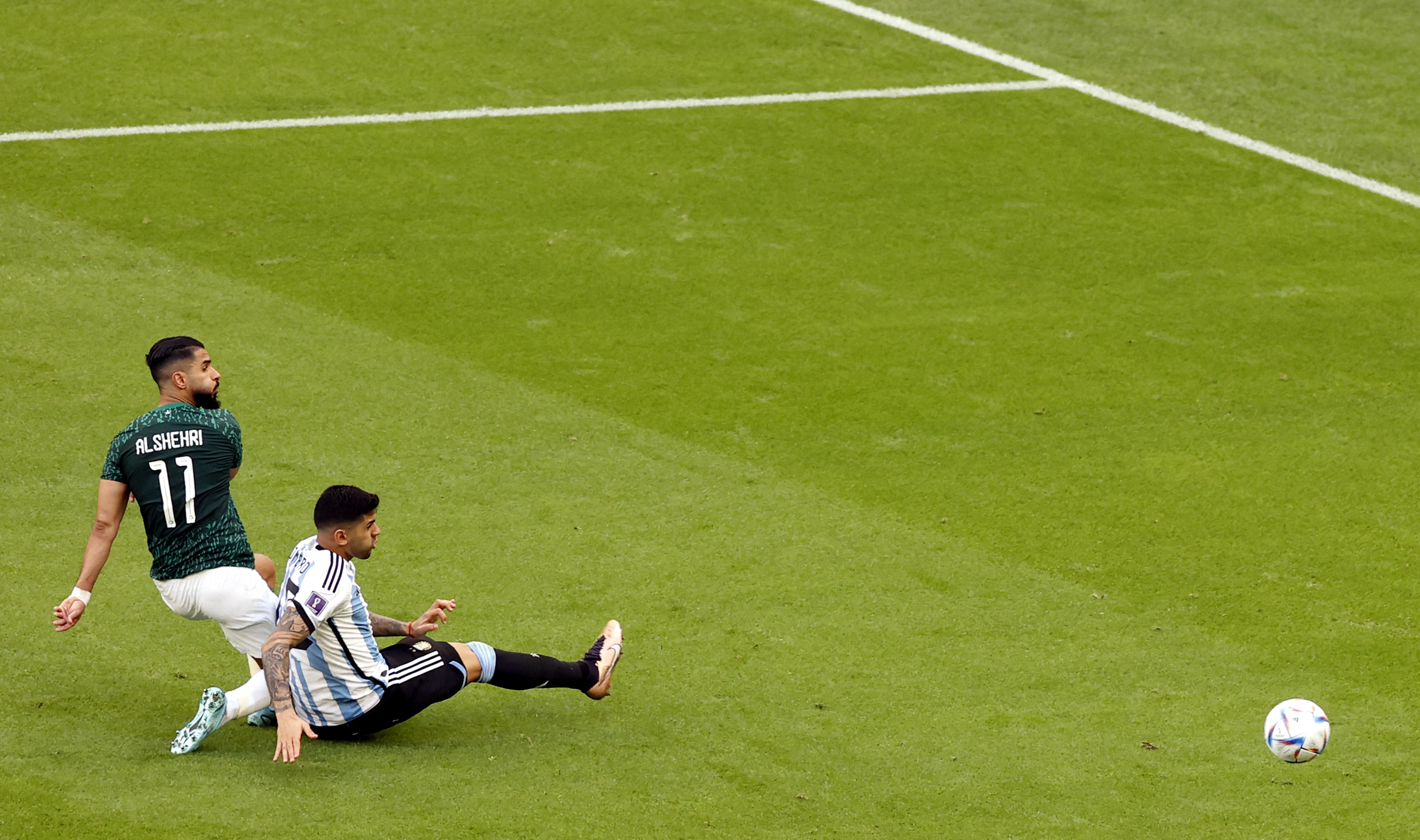 epa10319936 Saleh Alshehri of Saudi Arabia (L) scores the 1-1 during the FIFA World Cup 2022 group C soccer match between Argentina and Saudi Arabia at Lusail Stadium in Lusail, Qatar, 22 November 2022.  EPA-EFE/Rungroj Yongrit