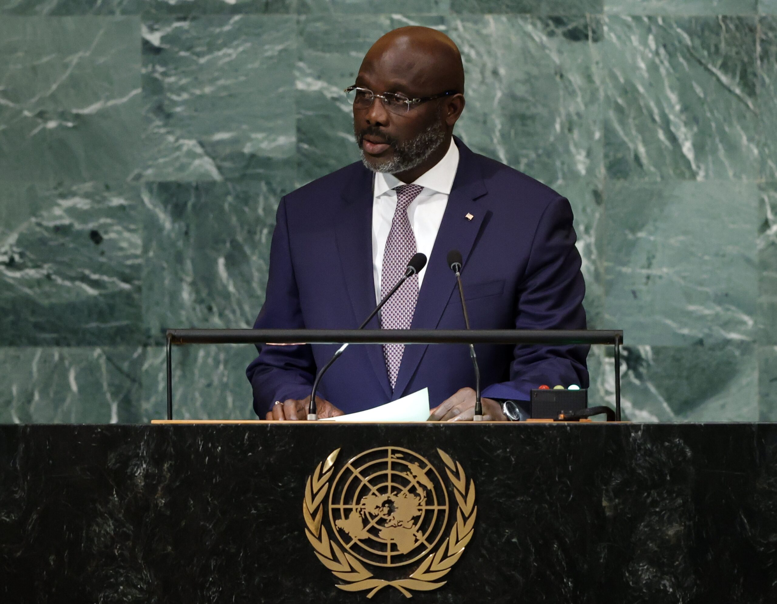 epa10199357 President of the Republic of Liberia George Manneh Weah, delivers his address during the 77th General Debate inside the General Assembly Hall at United Nations Headquarters in New York, New York, USA, 22 September 2022.  EPA-EFE/JASON SZENES